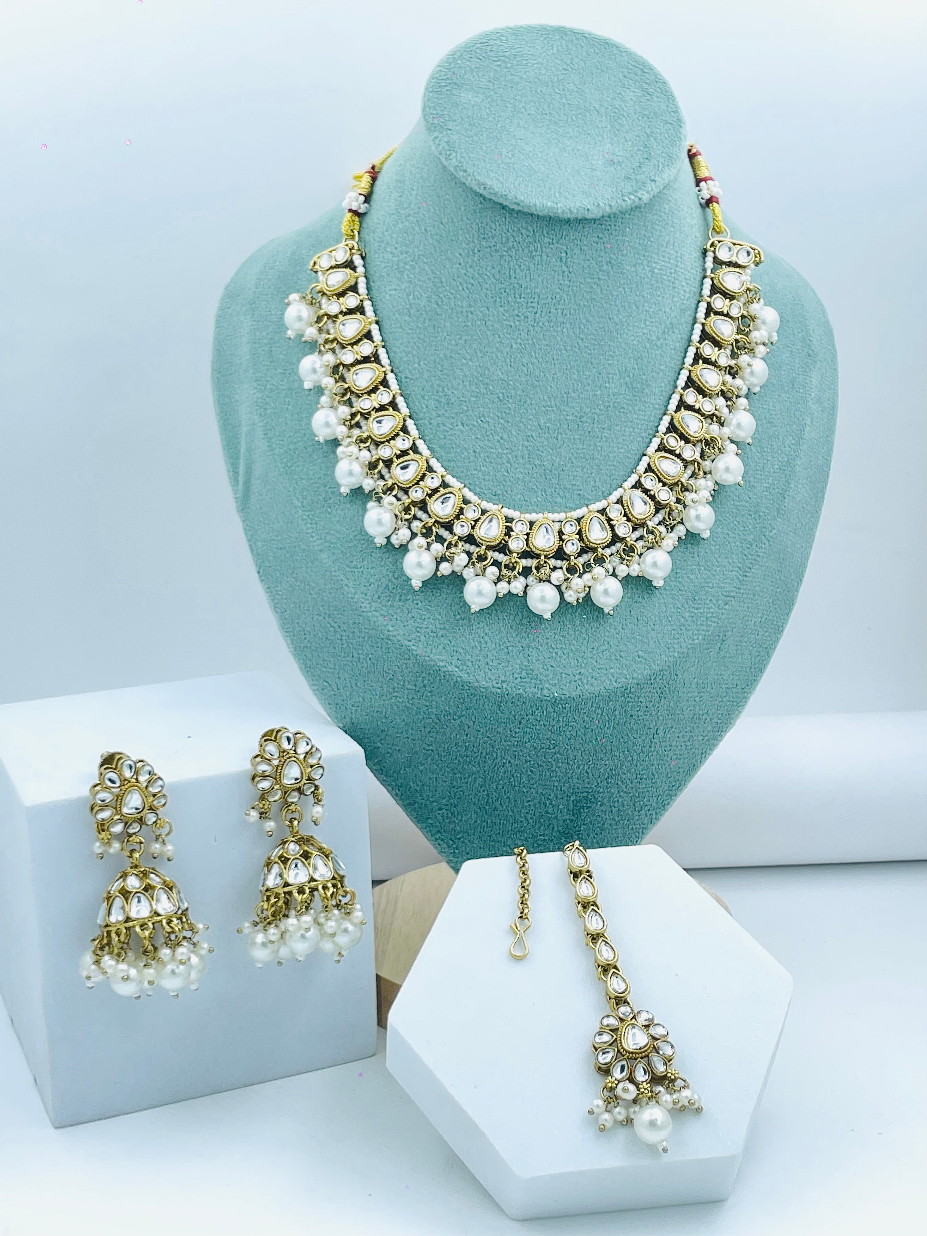 Elegant Pearl and Kundan Necklace Set with Earrings