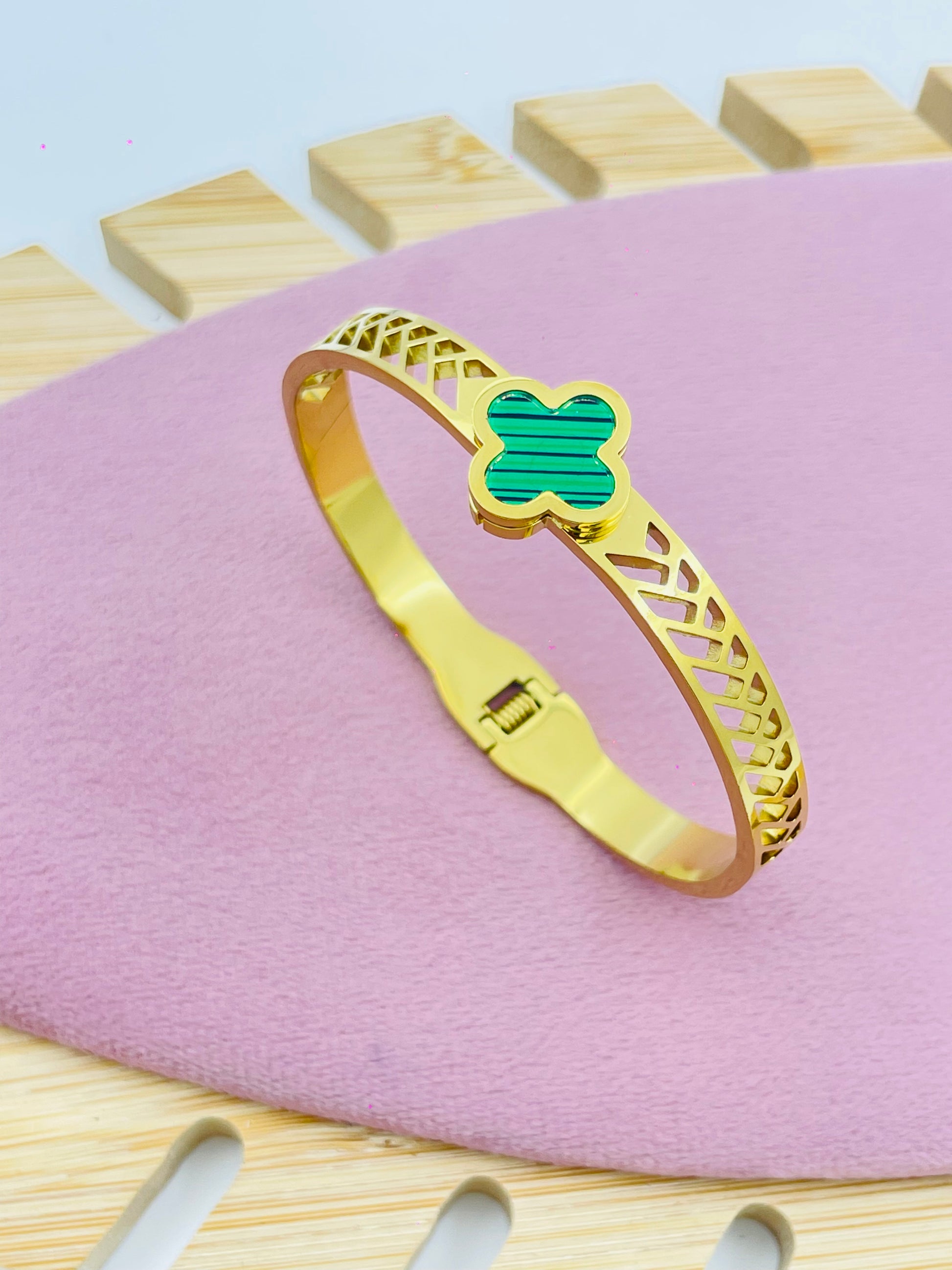 Stylish Gold Bangle with Green Striped Detail | Elegant Jewelry Piece
