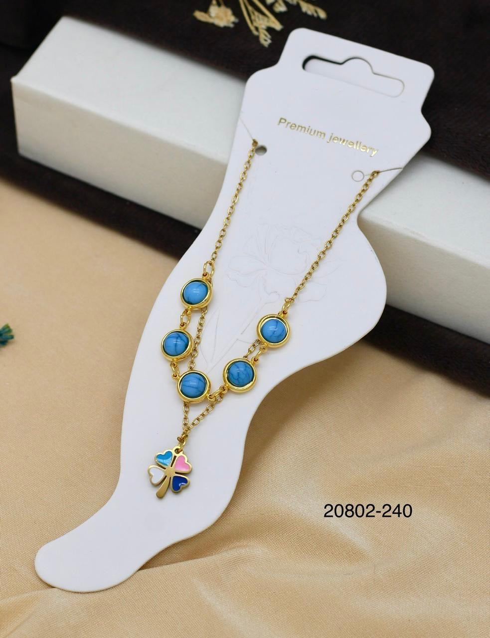 Gold Clover Charm Anklet with Blue Stones – Women’s Trendy Foot Jewellery