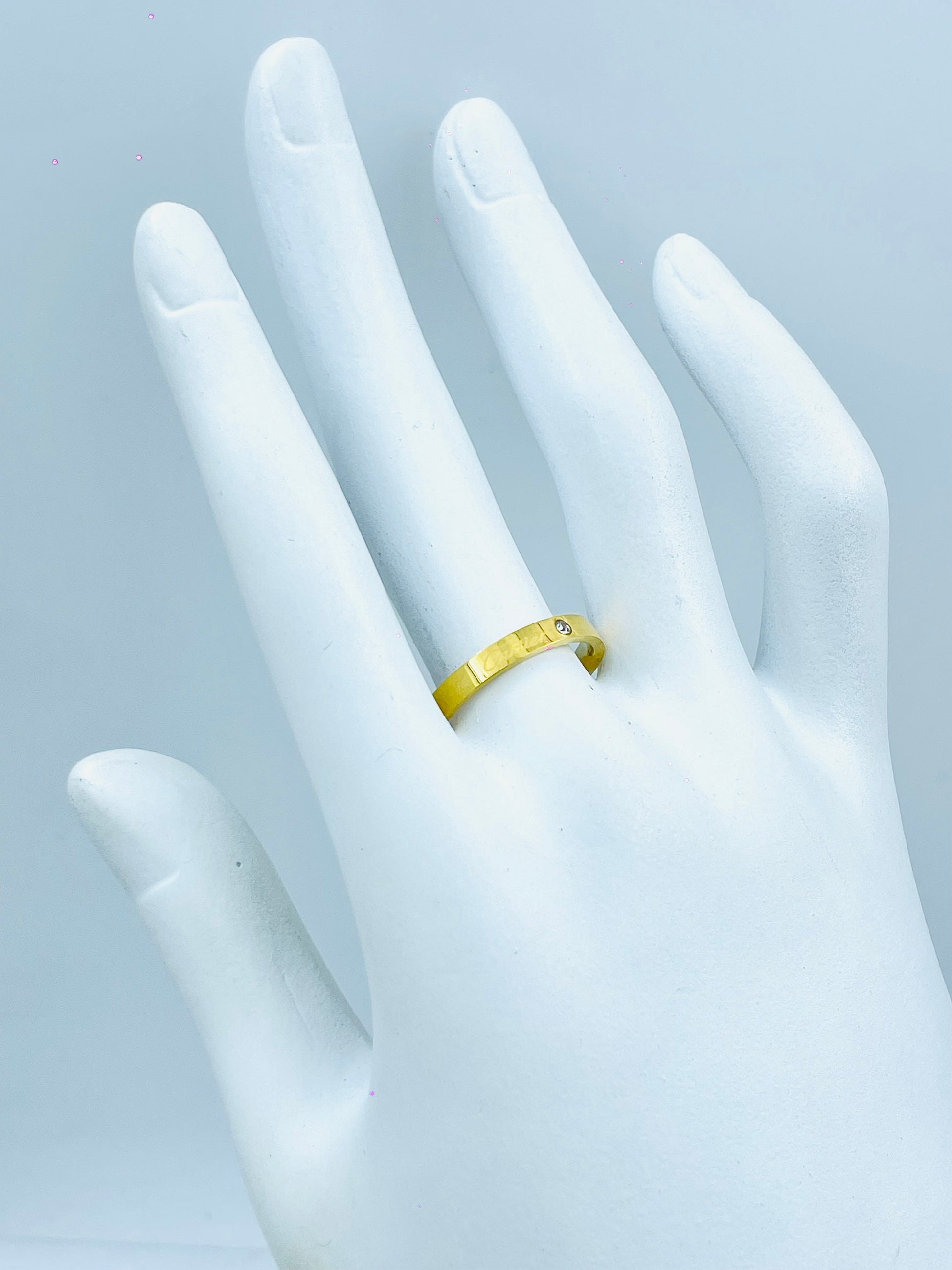 Elegant Gold Band Ring with Diamond Accent