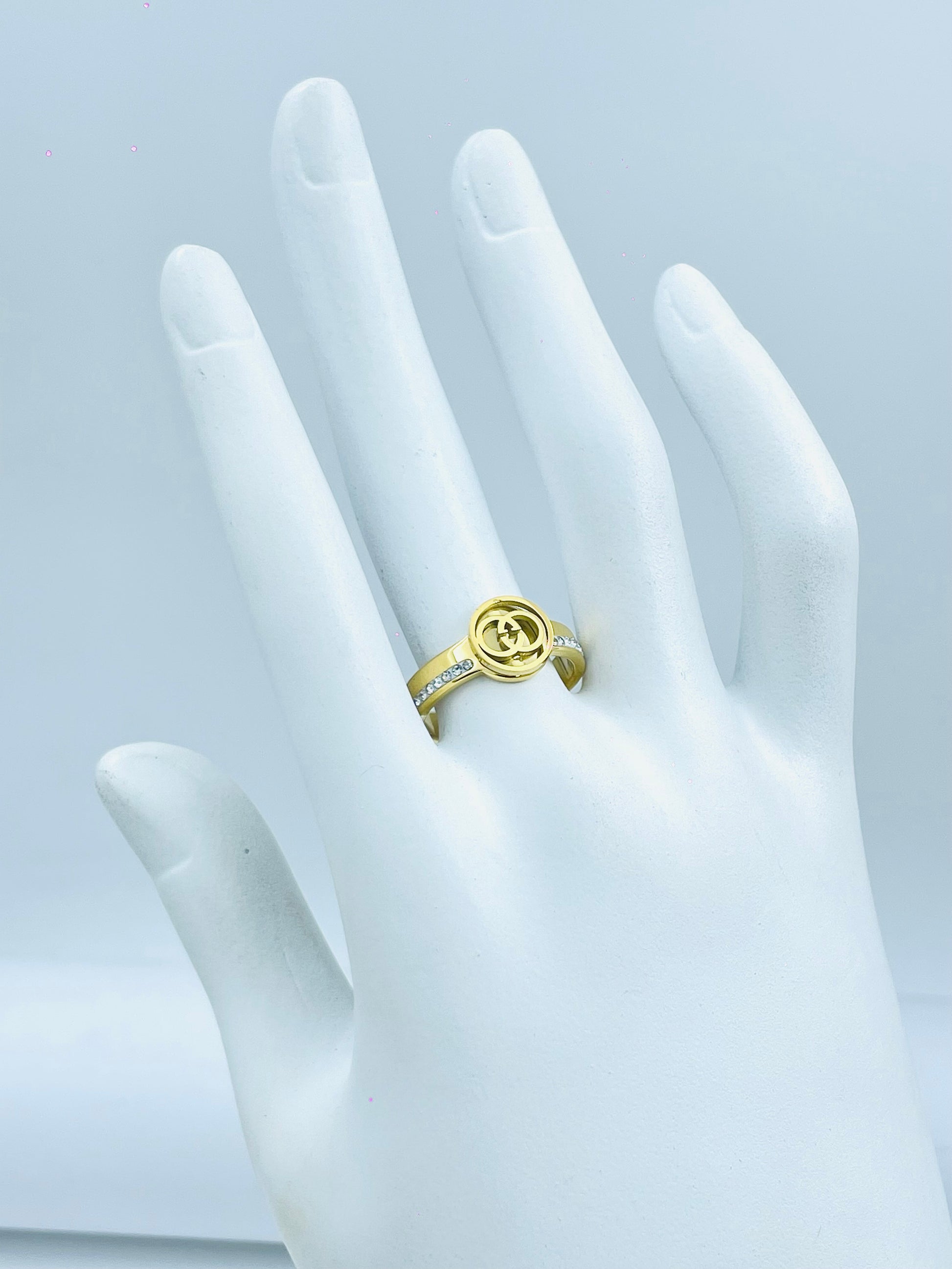 Elegant GoldPlated Solitaire Ring with Diamond Accents