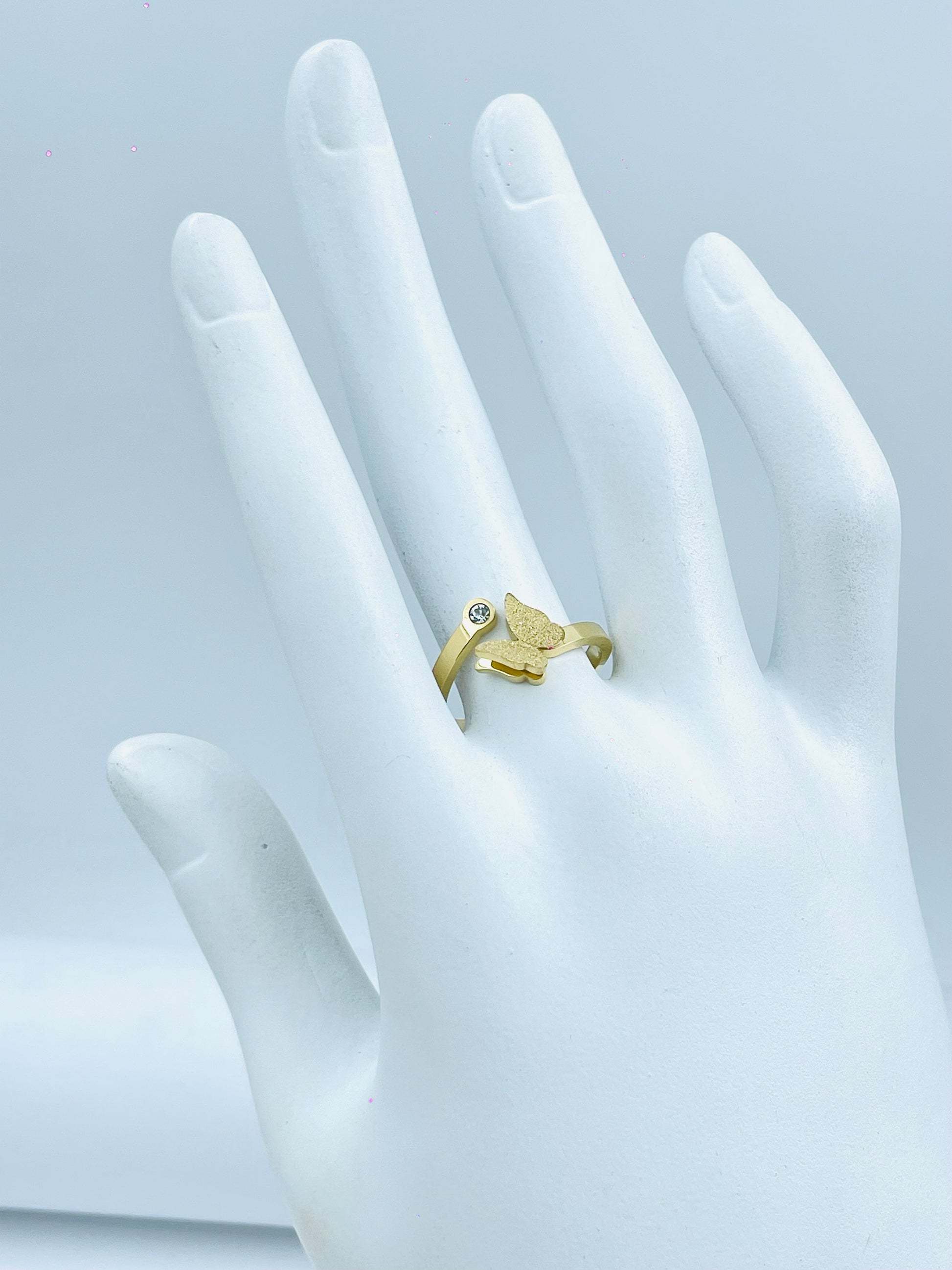 Elegant Gold Hamsa Hand Ring with Diamond Accent