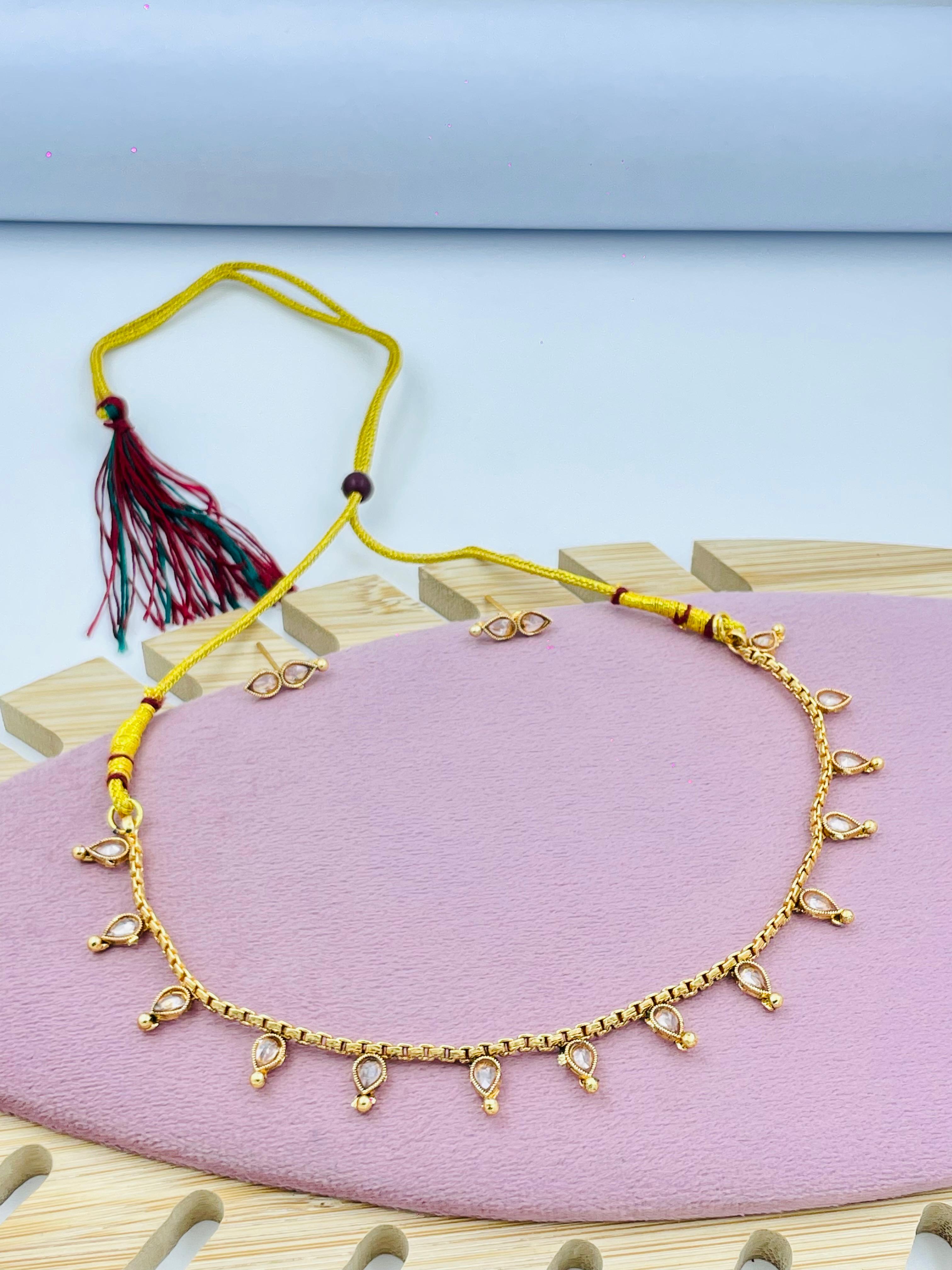 Gold Tone Necklace with White Teardrop Stones and Earrings – Simple Jewelry