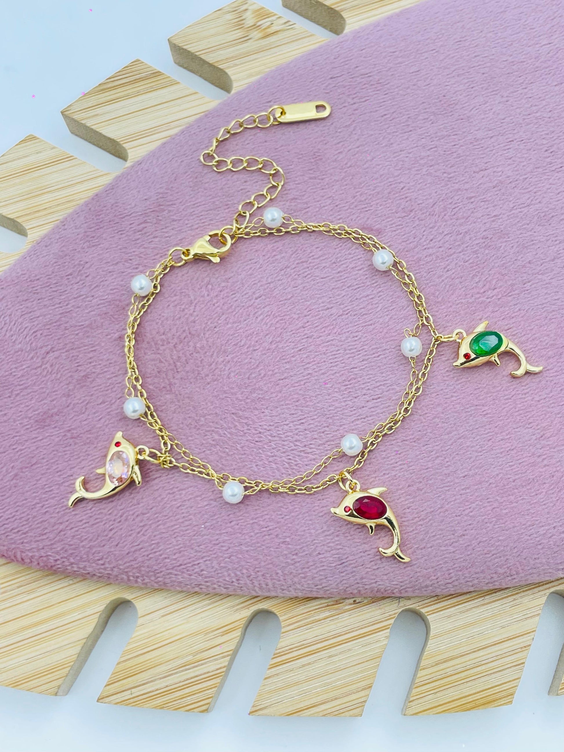 Elegant Gold Dolphin Charm Bracelet with Pearls