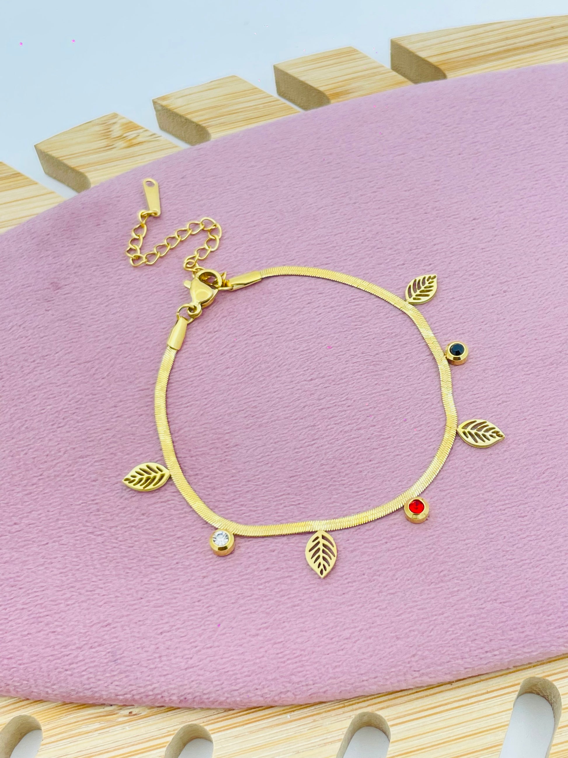 Elegant Gold Leaf Charm Bracelet with Gem Accents