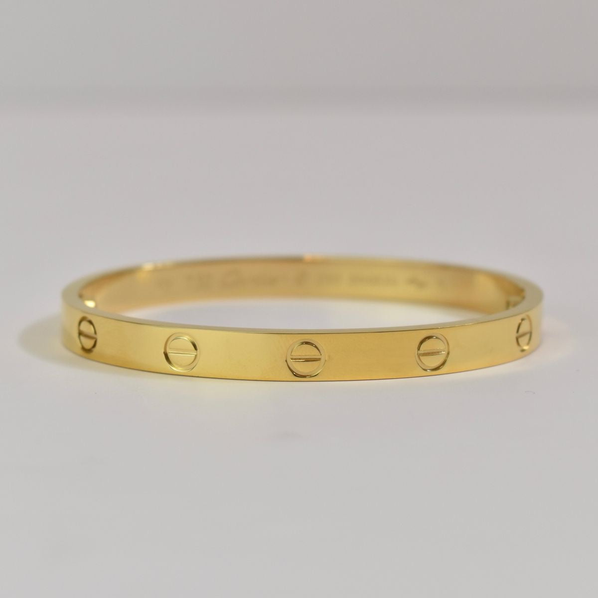 Classic Gold Screw Motif Bracelet – Sleek Minimalist Bangle