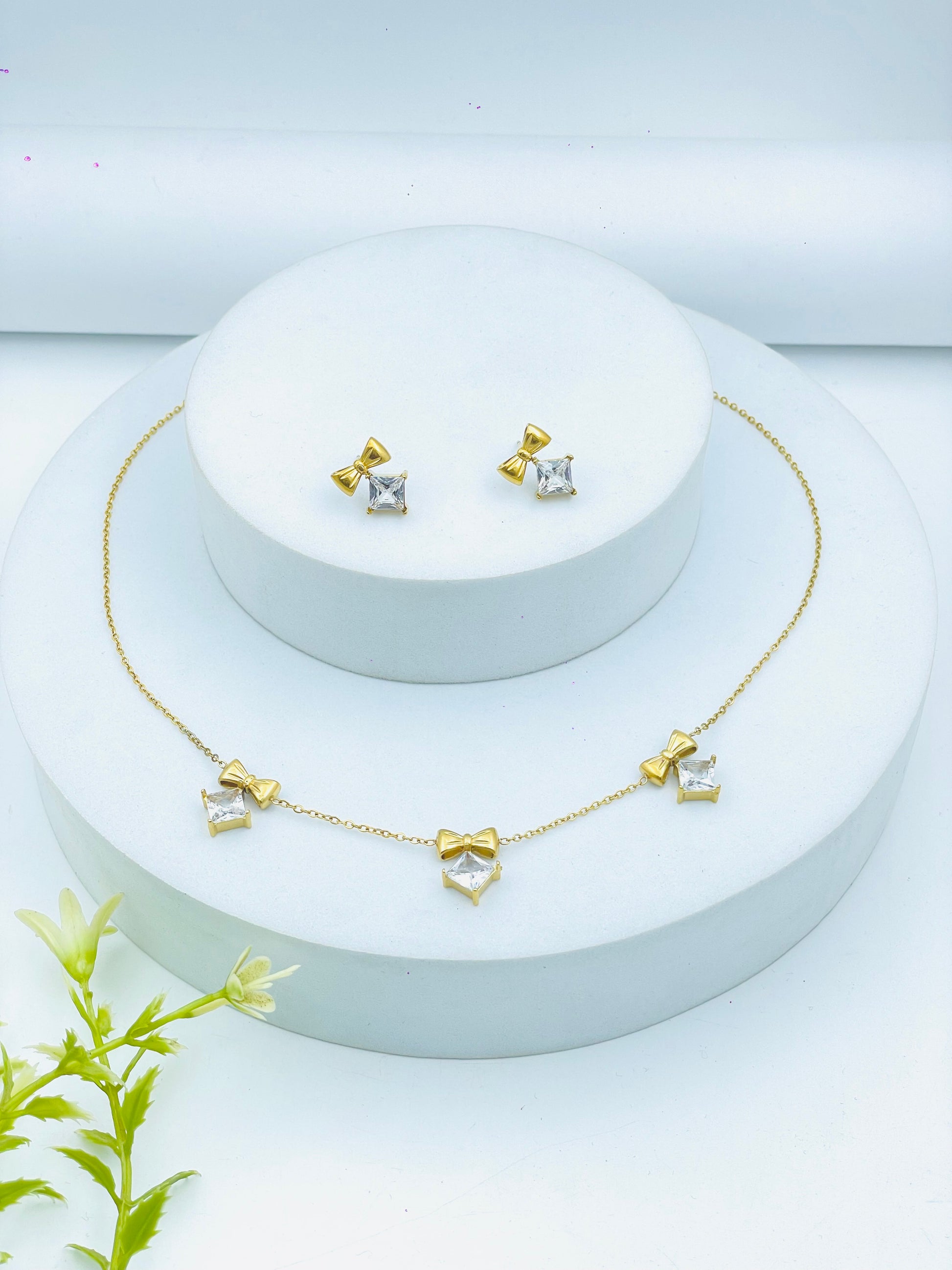 Elegant Gold and Silver Bow Necklace and Earring Set