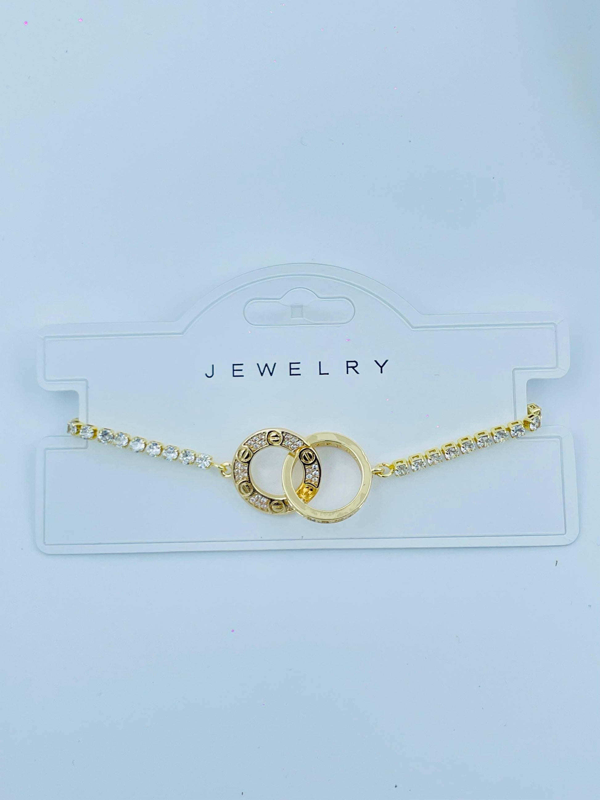 Interlocking Gold Ring Bracelet – Elegant Crystal Accent Jewelry