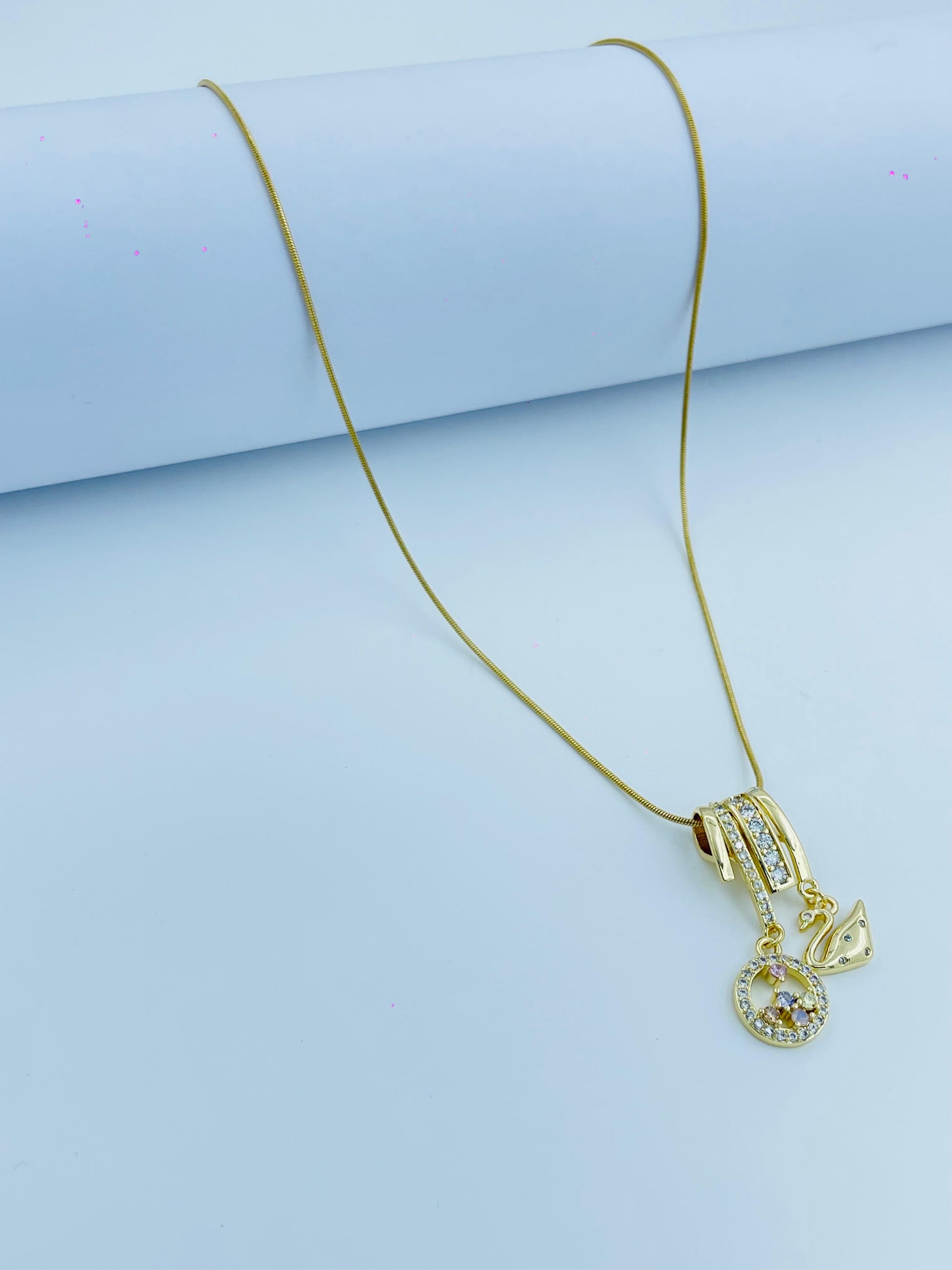 Elegant Gold Pendant Necklace with Swan & Crystal Circle Charms