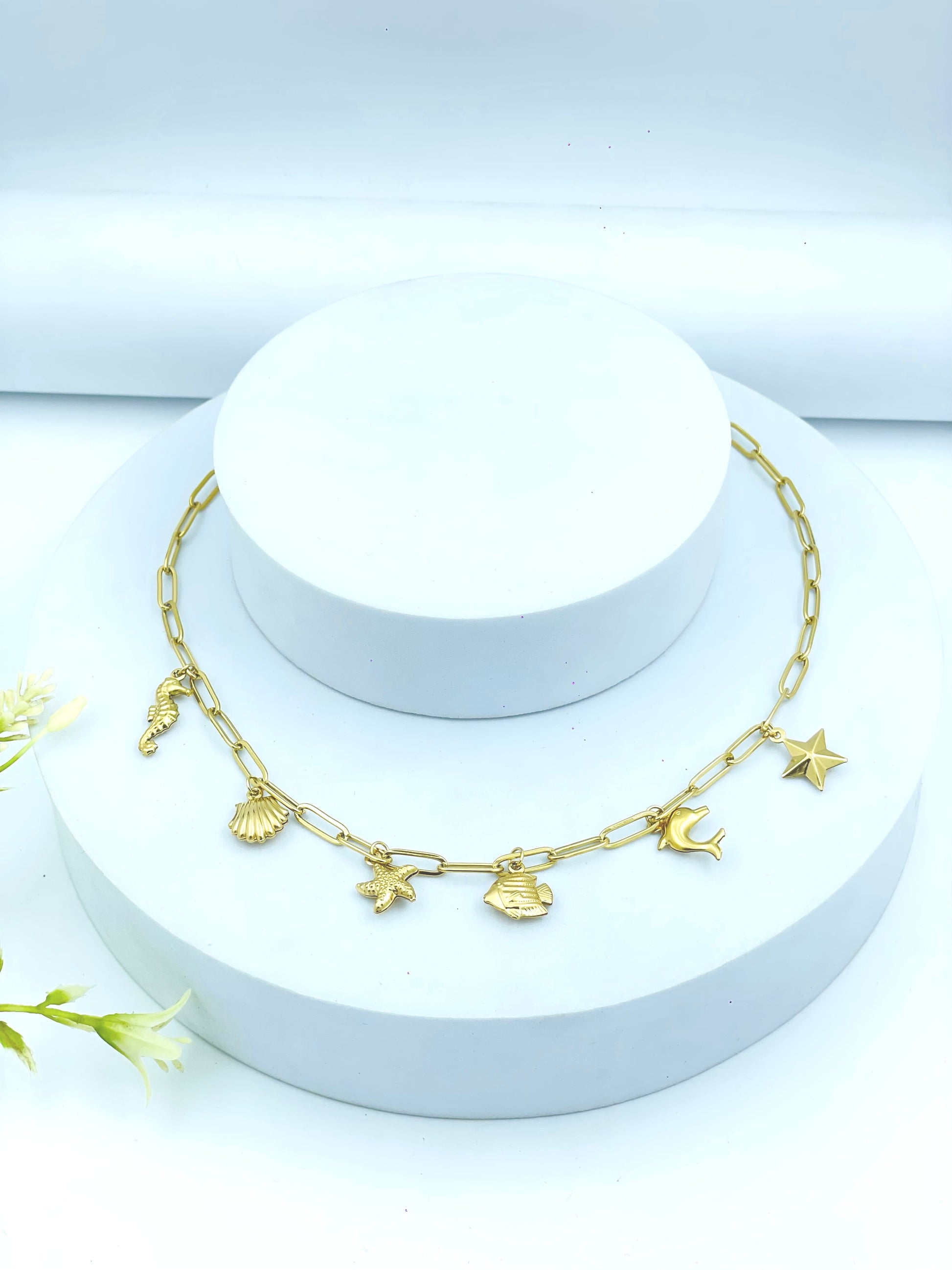 Elegant Gold Charm Necklace with OceanThemed Charms