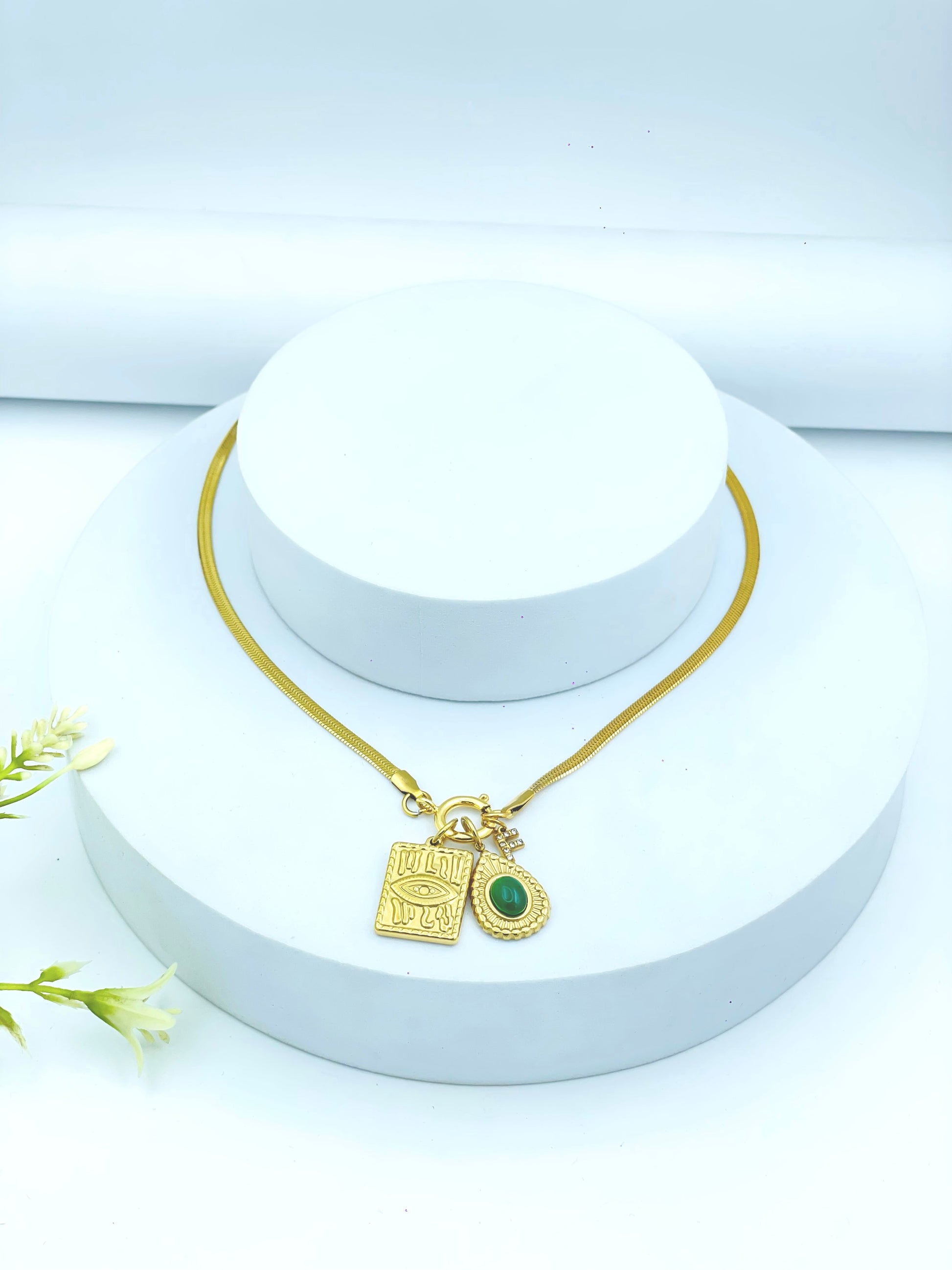 Elegant Gold Pendant Necklace with Green Stone