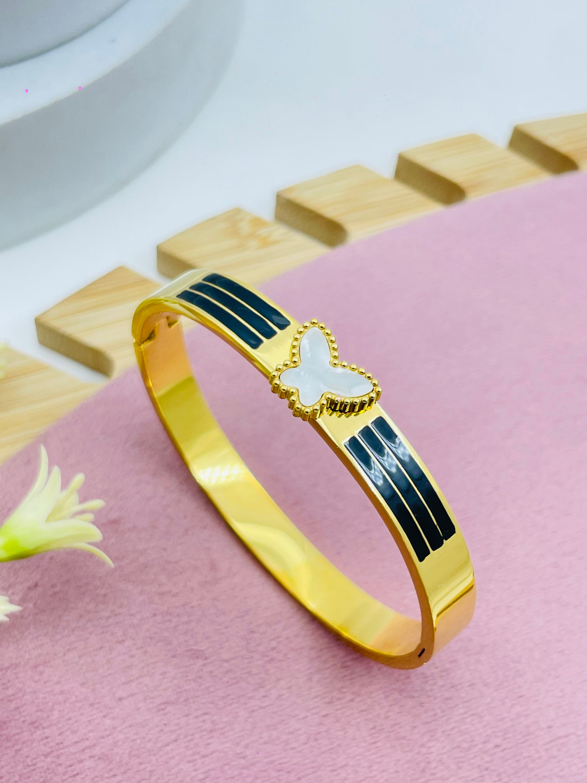 Elegant Gold and Black Enamel Bracelet with Heart