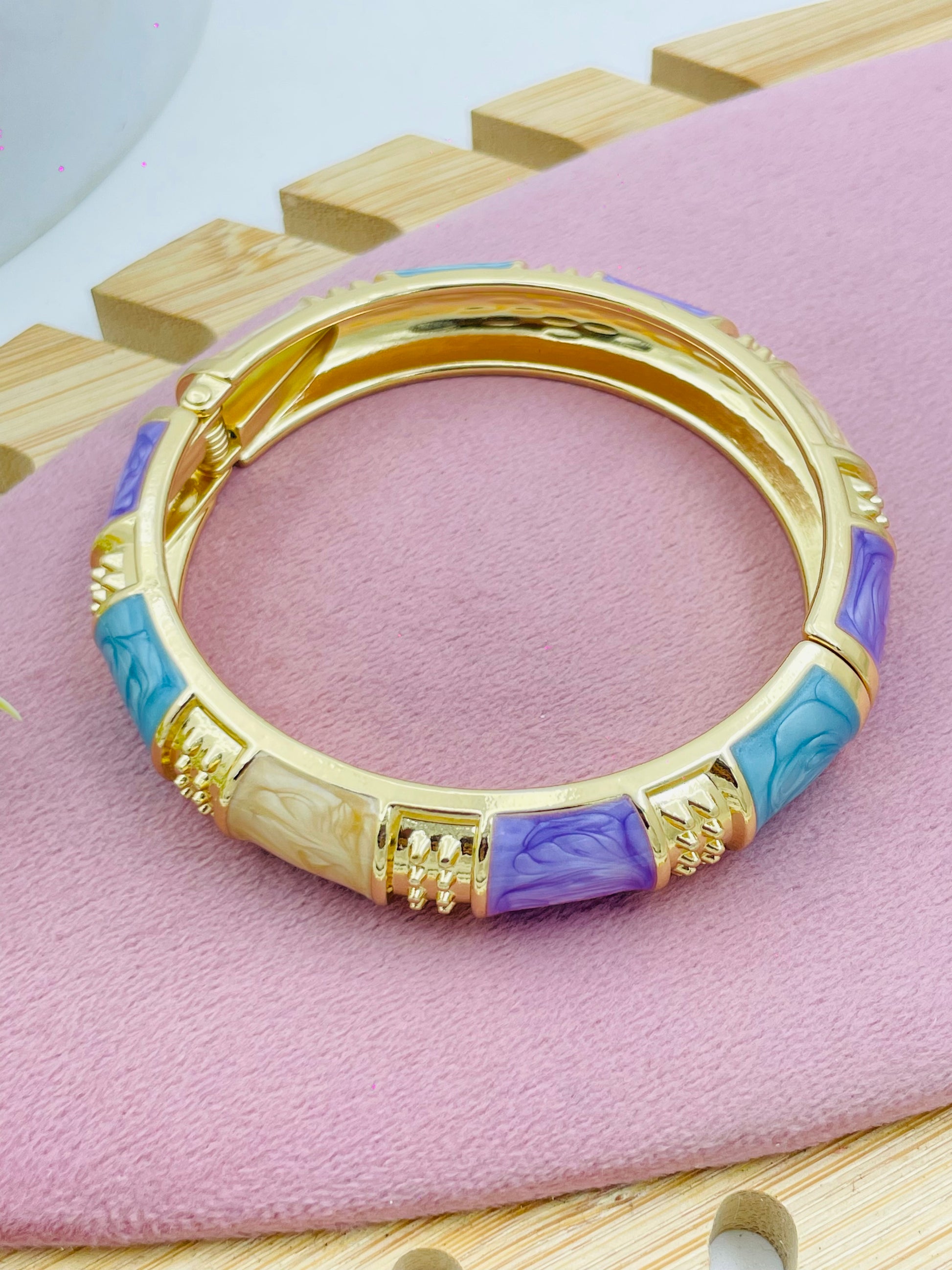 Elegant Gold Bangle with Pastel Colored Accents
