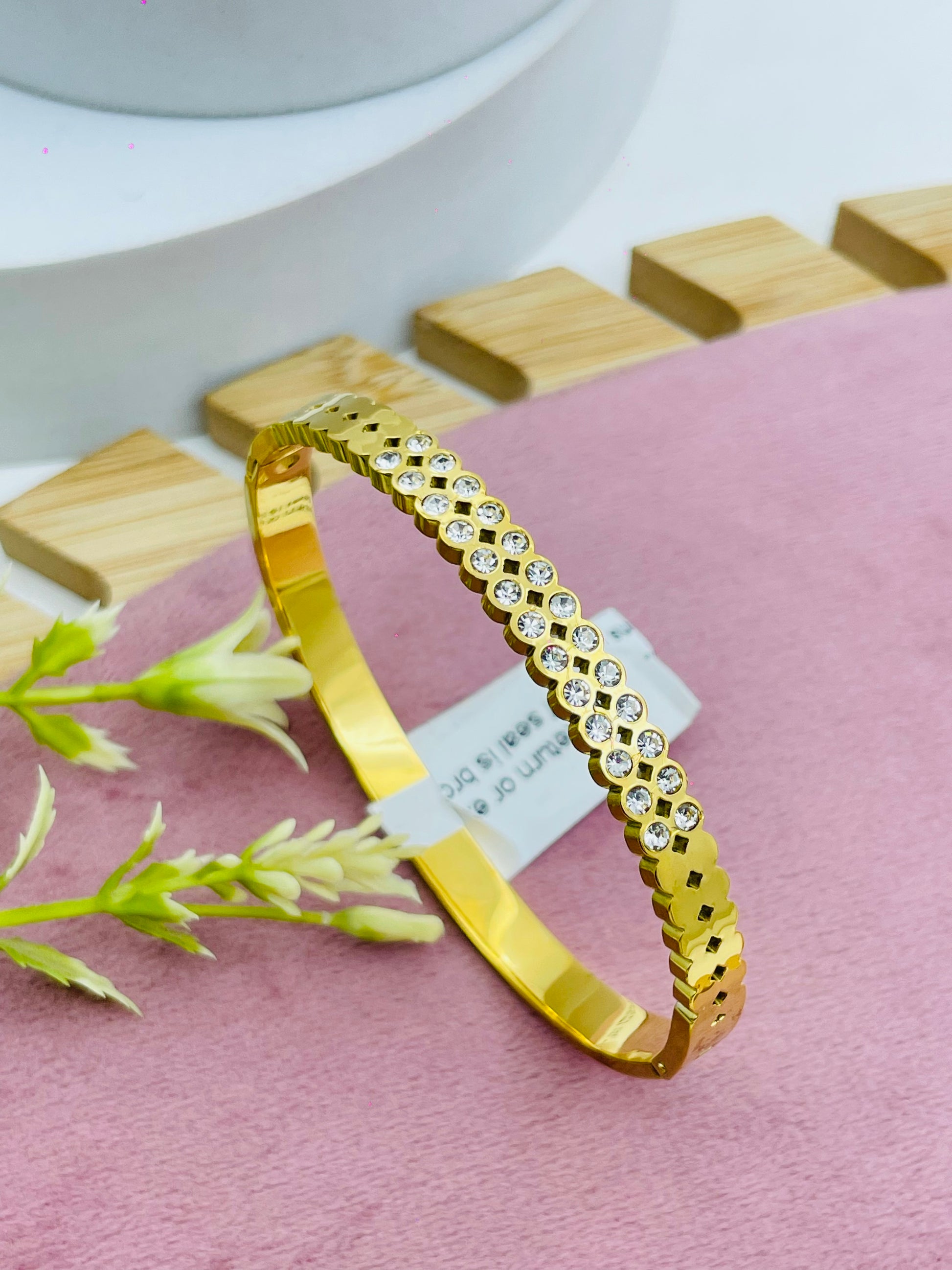 Elegant Gold Bangle with Stone Accents  Perfect Accessory