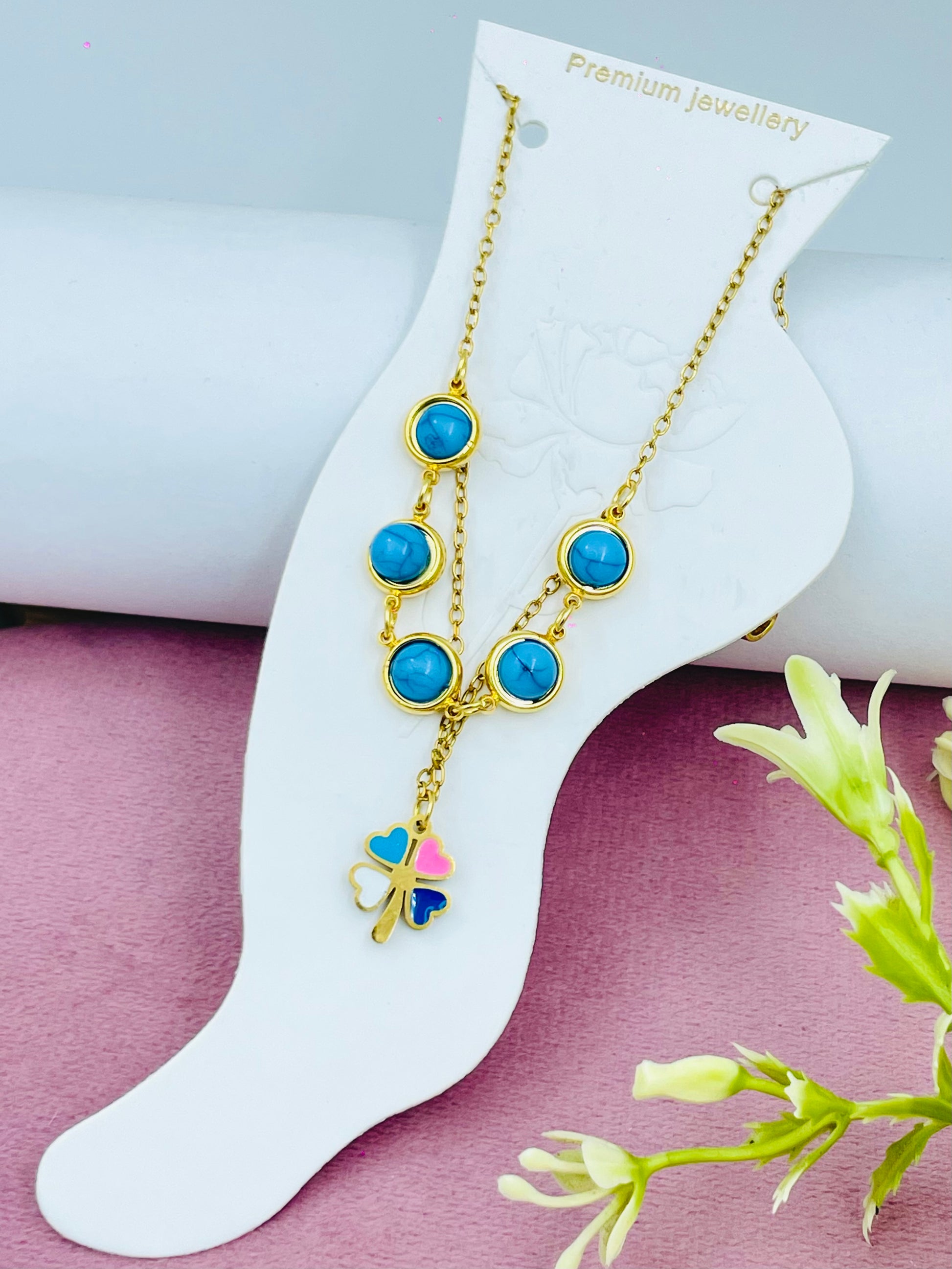 Elegant Blue Stone Gold anklets with Clover Pendant