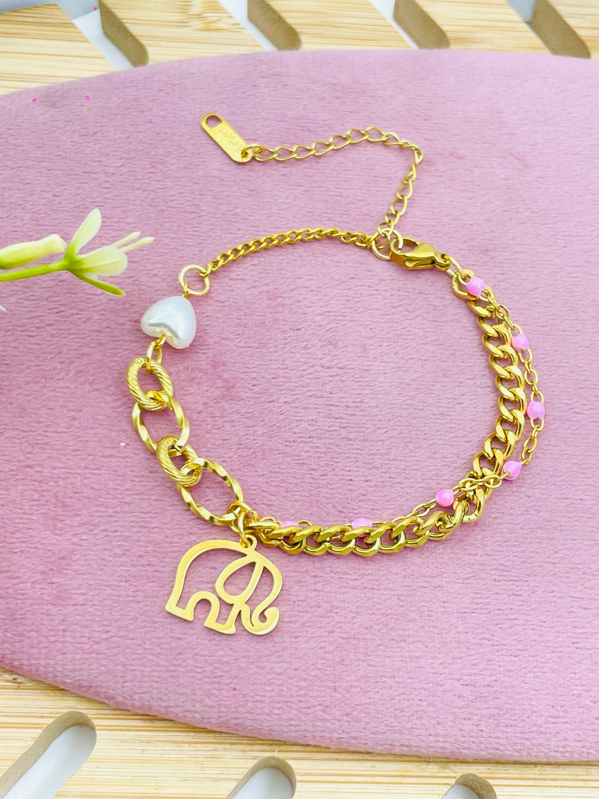 Gold Elephant Charm Bracelet with Pink Accents