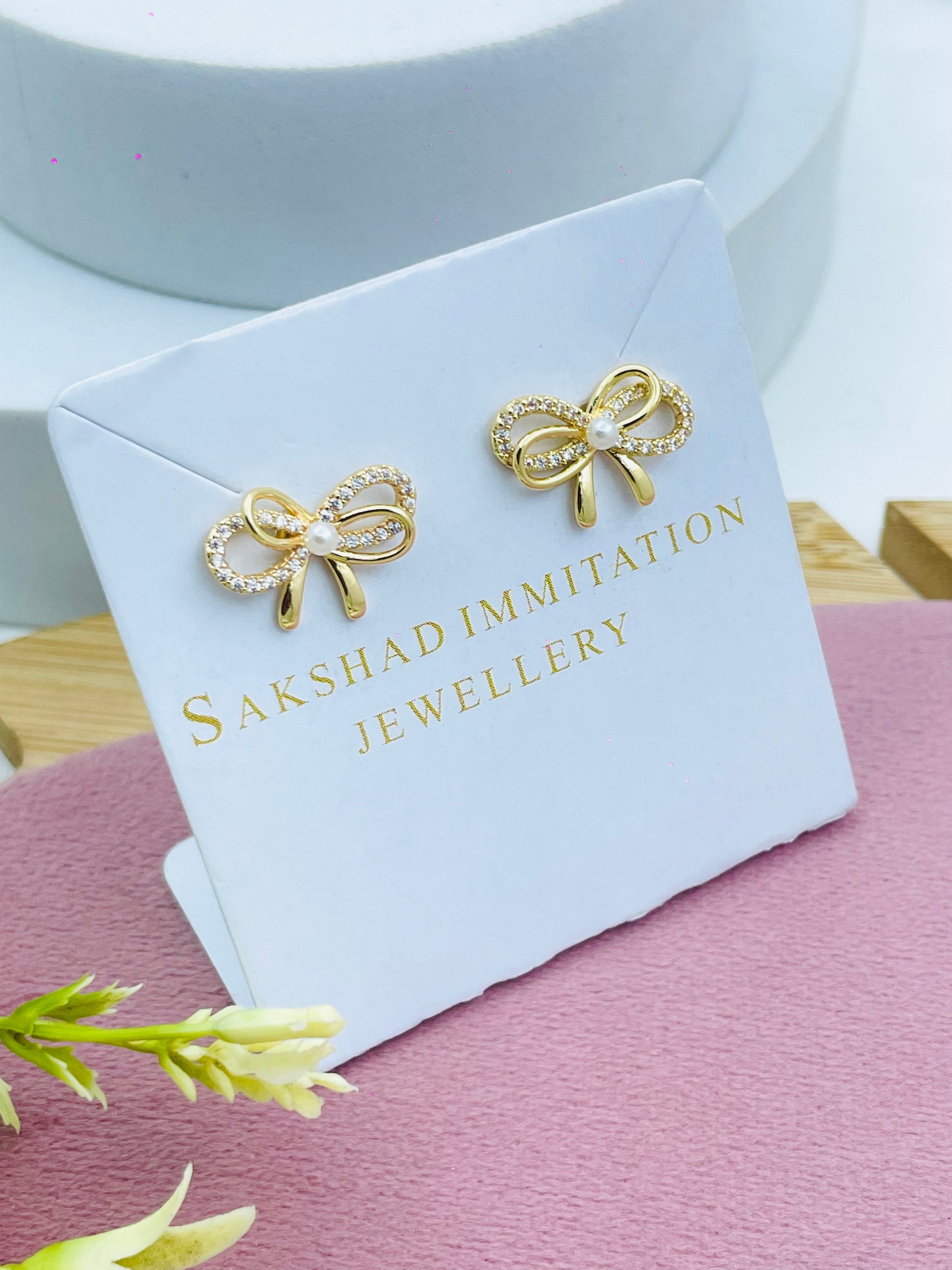 Elegant Bow Shaped Earrings  Sakshad Jewellery