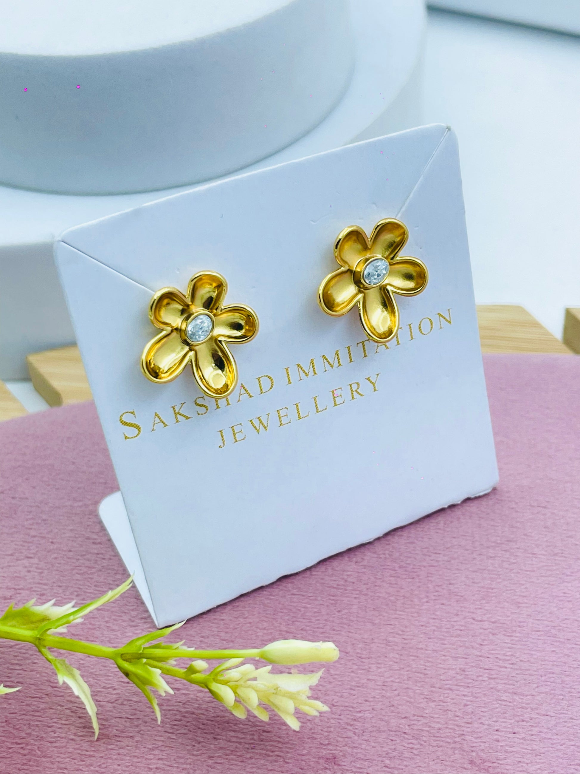 Elegant Gold Flower Earrings with Gem Center