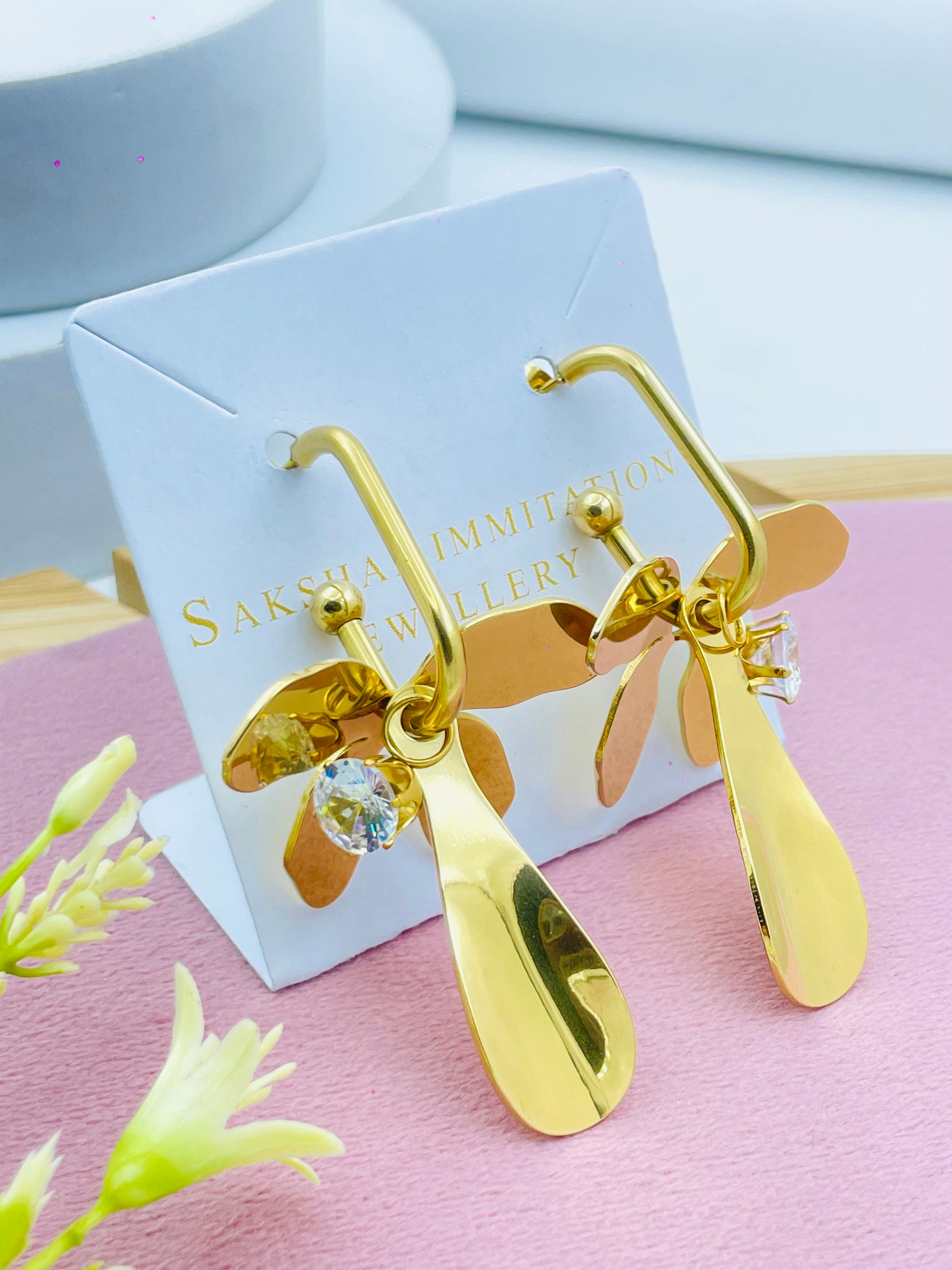 Elegant GoldPlated Leaf Design Earrings with Crystal Accents