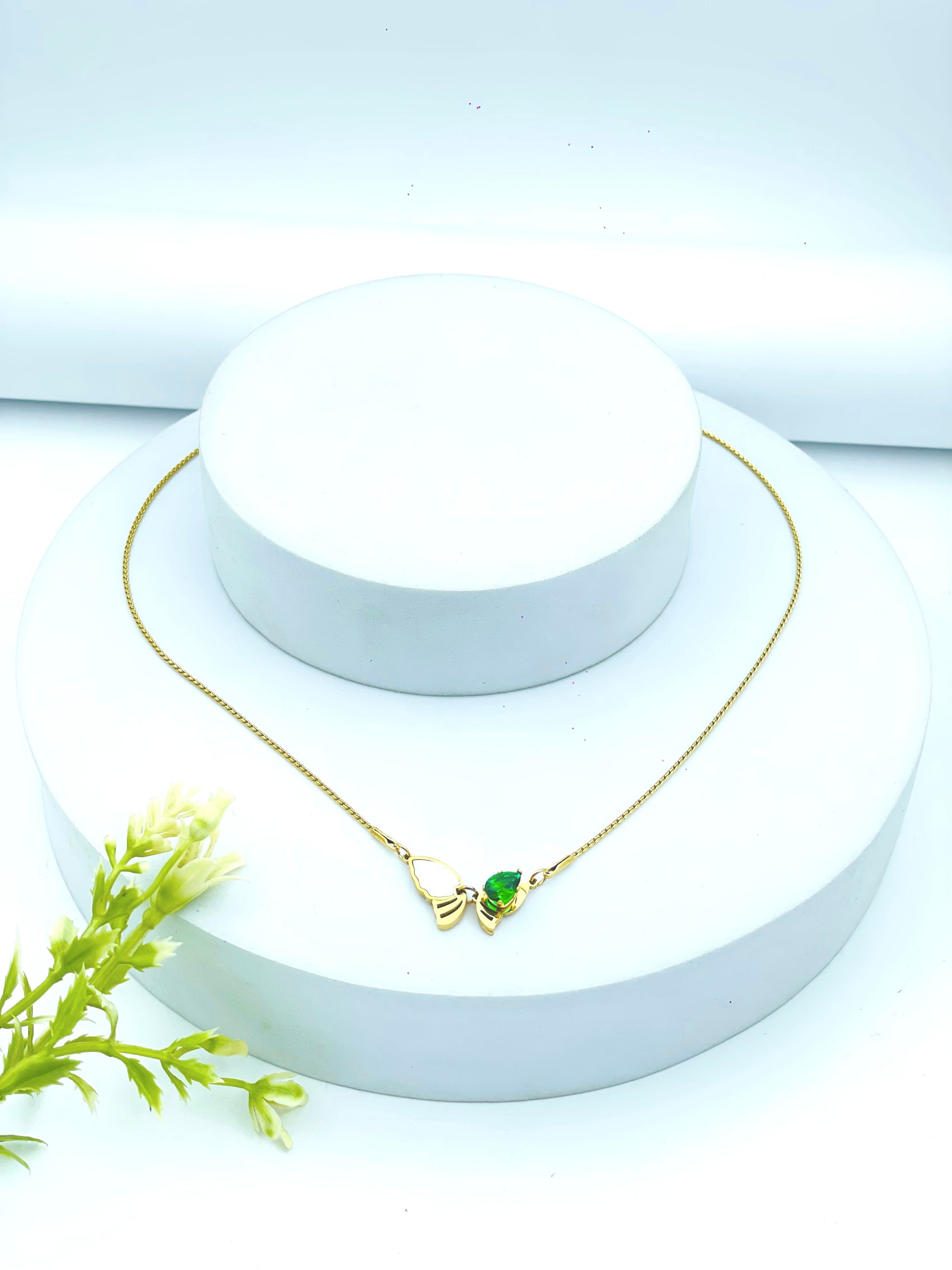 Elegant Gold Lovebirds Necklace with Green Accent