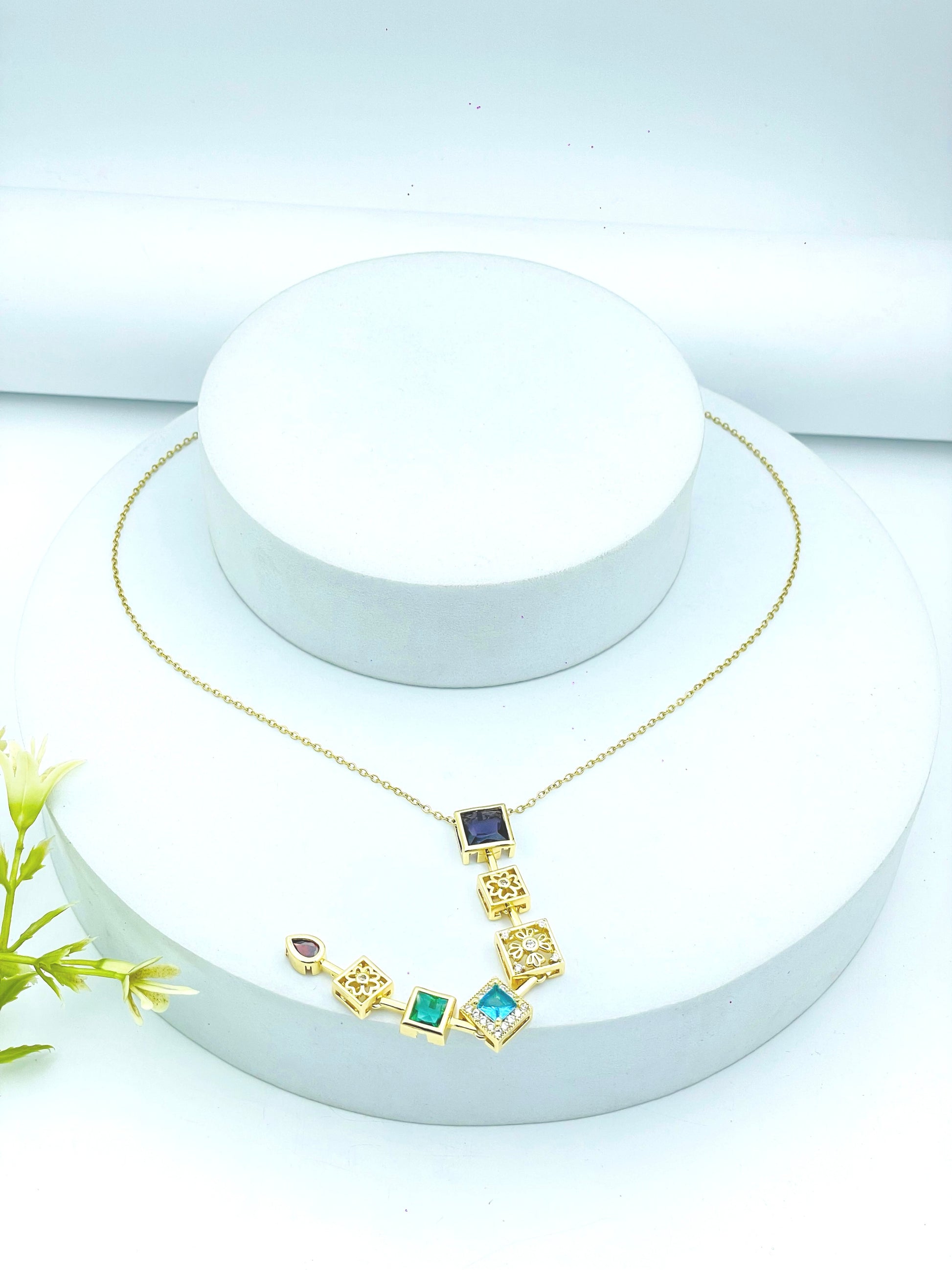 Elegant Gold Geometric Necklace with Multicolored Gemstones