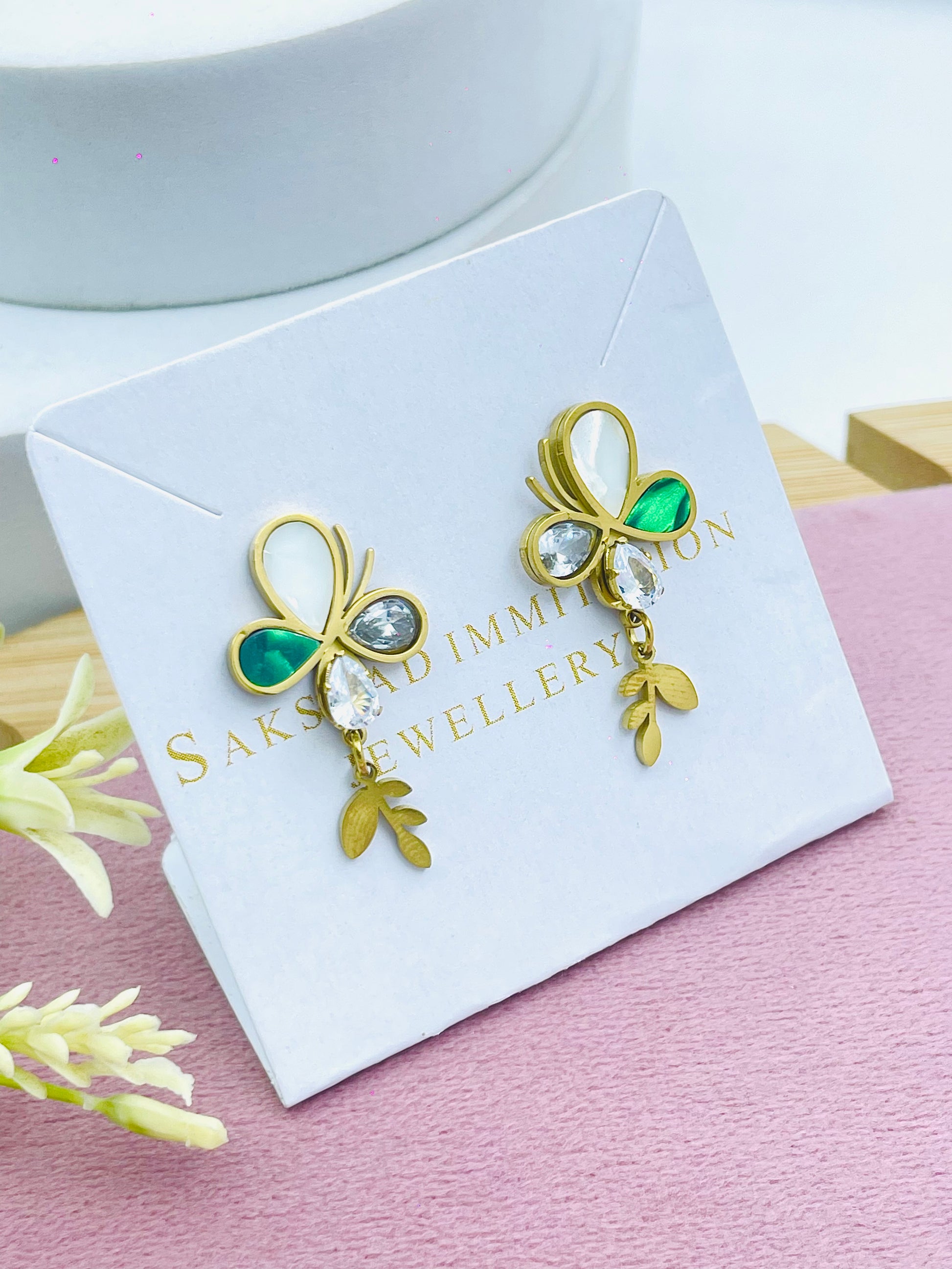 Elegant Gold Leaf Design Earrings with Gemstones