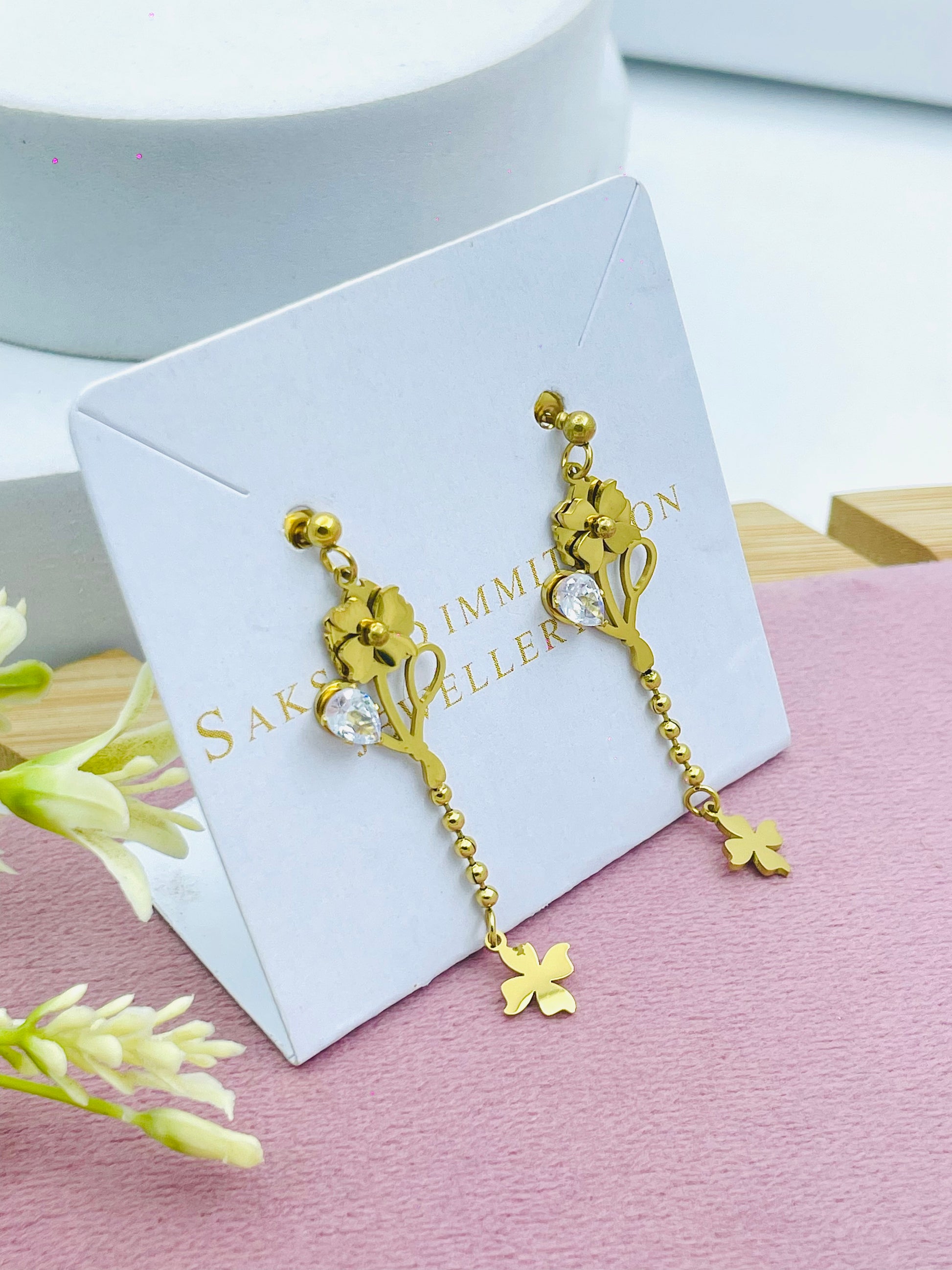 Elegant Gold Floral Drop Earrings with Crystal Accents