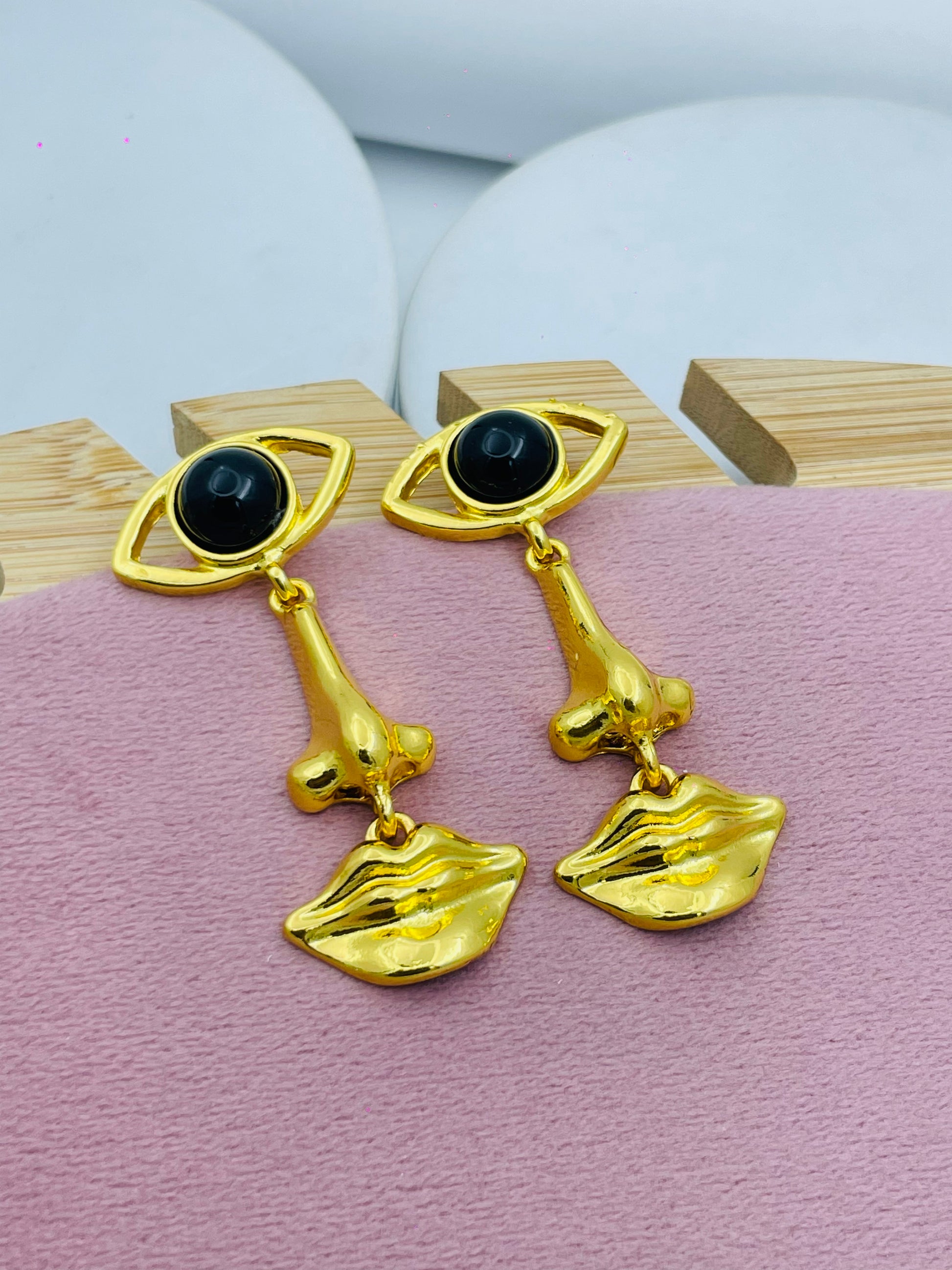 Stylish Abstract Eye and Lip Gold Earrings