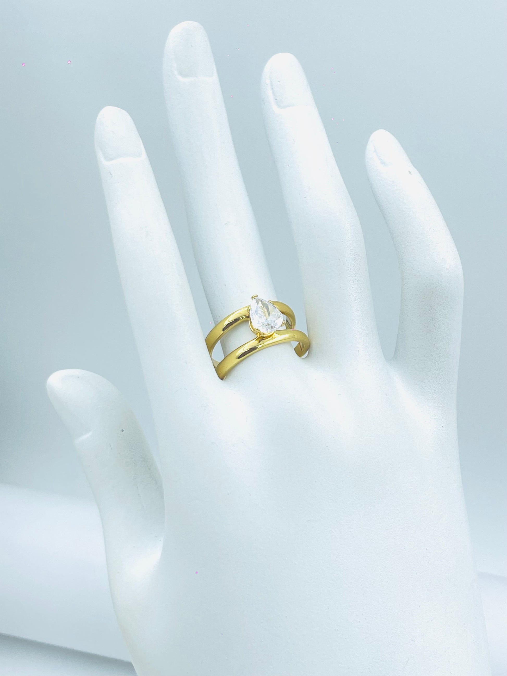 Elegant Gold PearShaped Engagement Ring Set