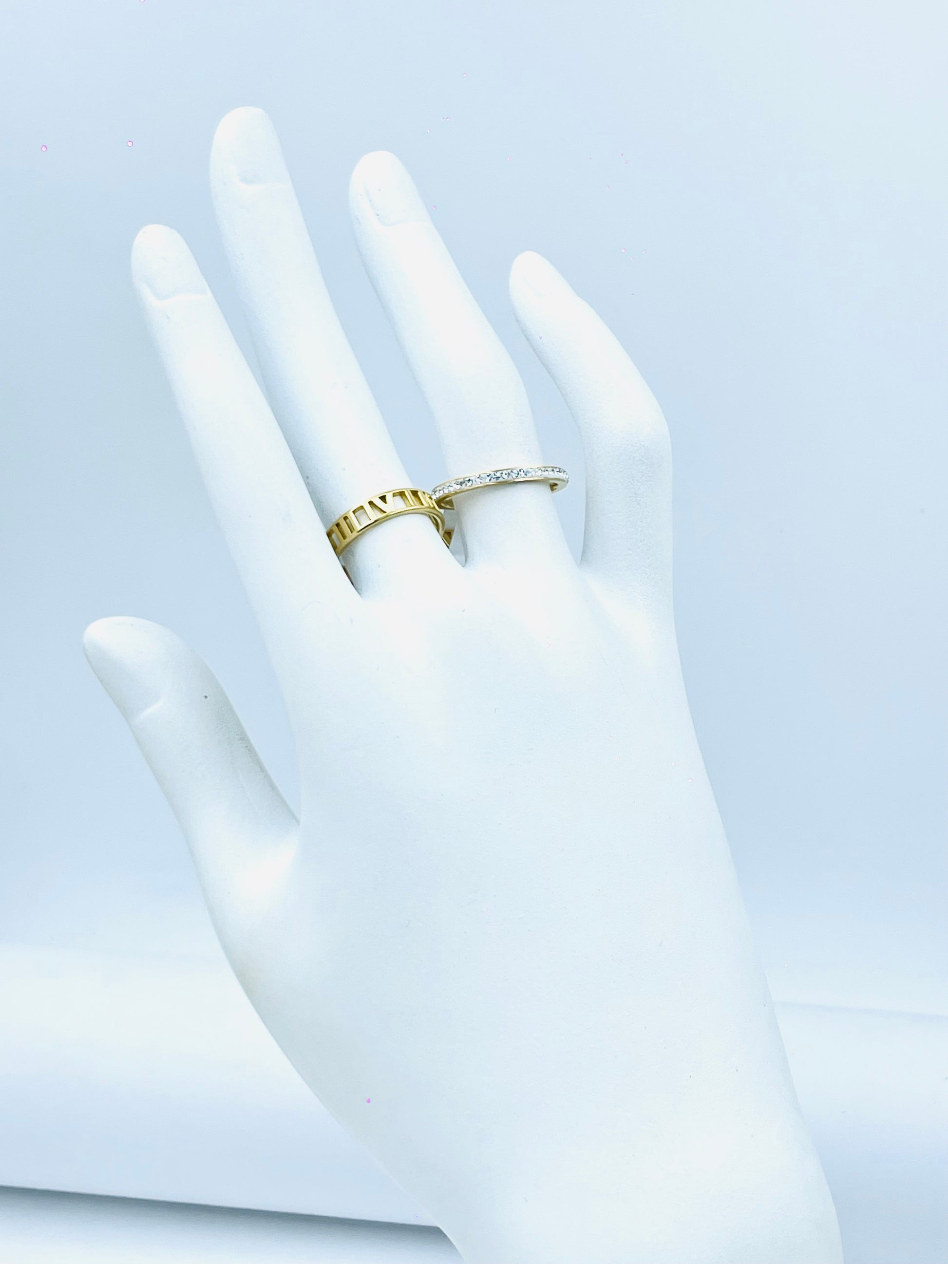 Elegant Gold Ring with Diamond Accents