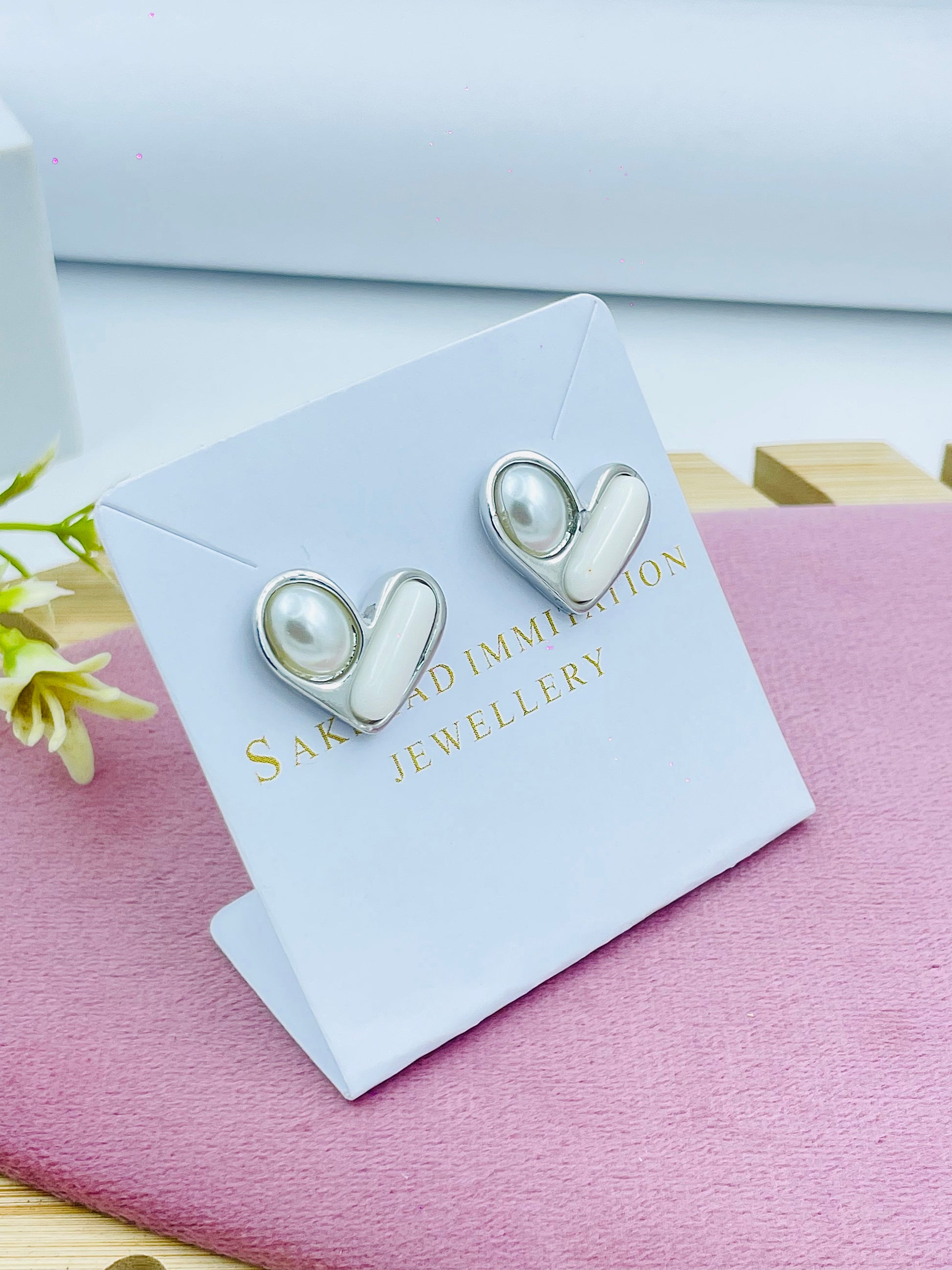 Elegant Silver Earrings with Pearl Accent  Sakard ImmiTation Jewellery