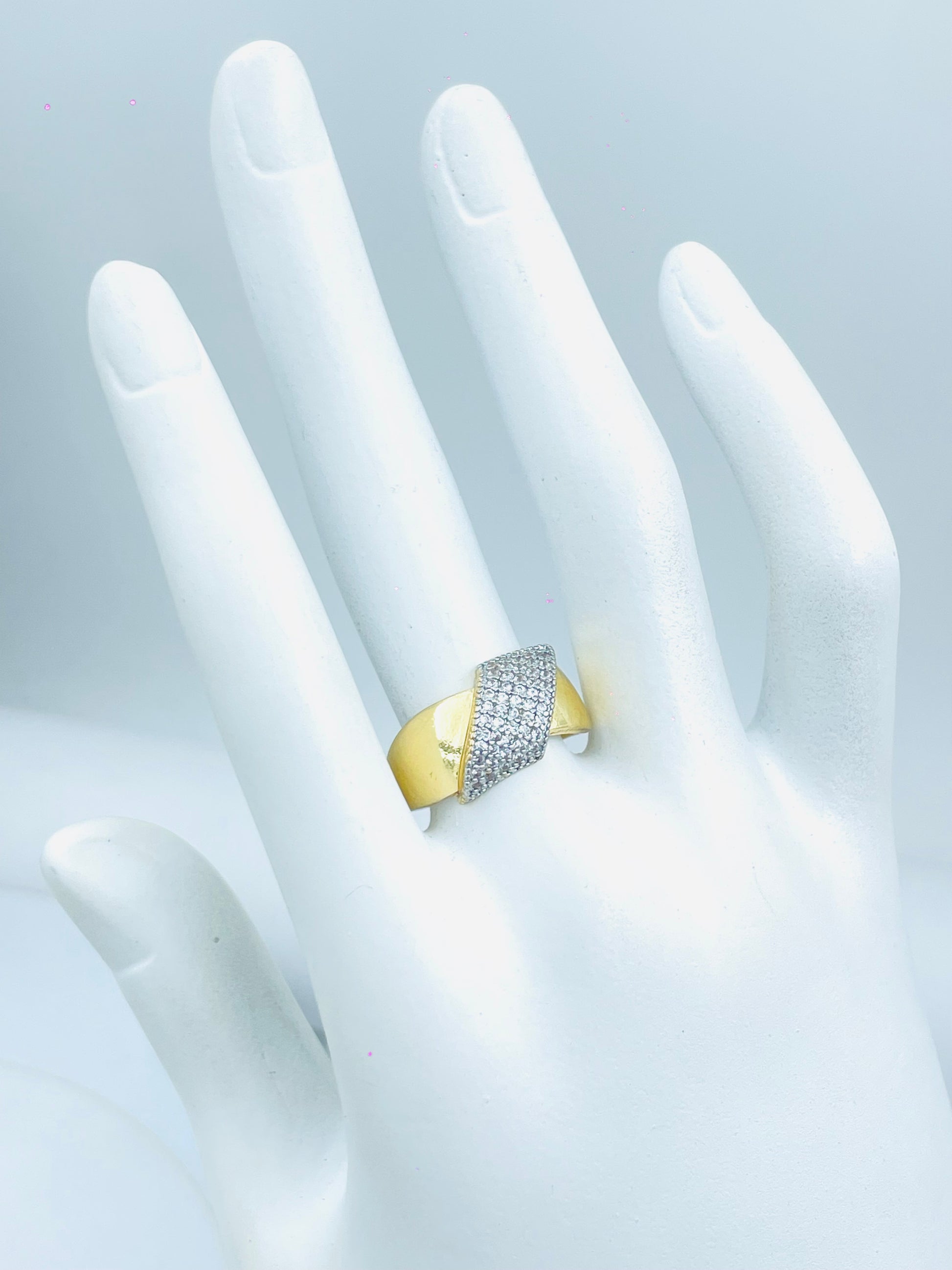 Elegant Gold Ring with Diamond Accents