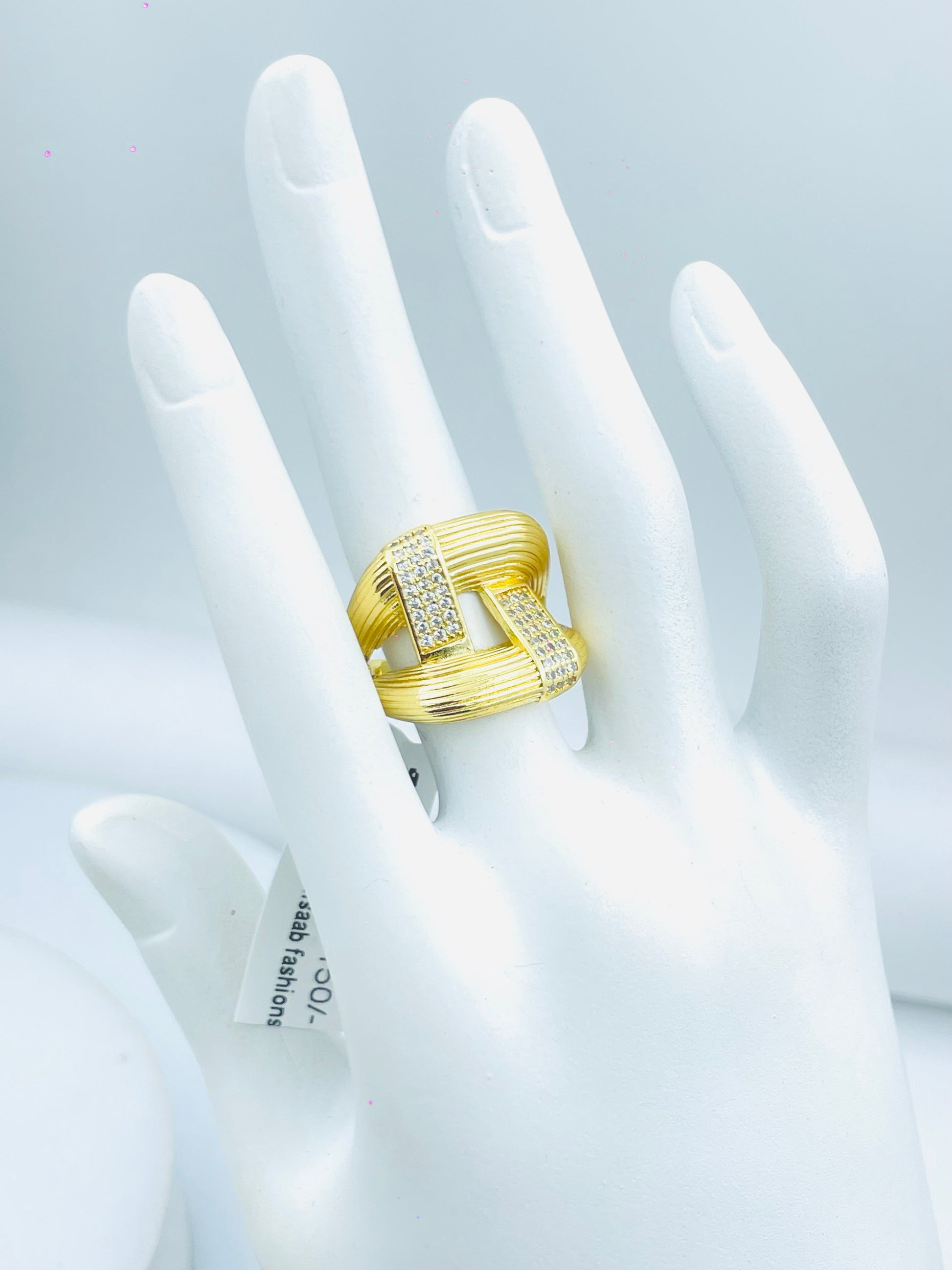 Elegant Gold Textured Geometric Ring with Diamonds