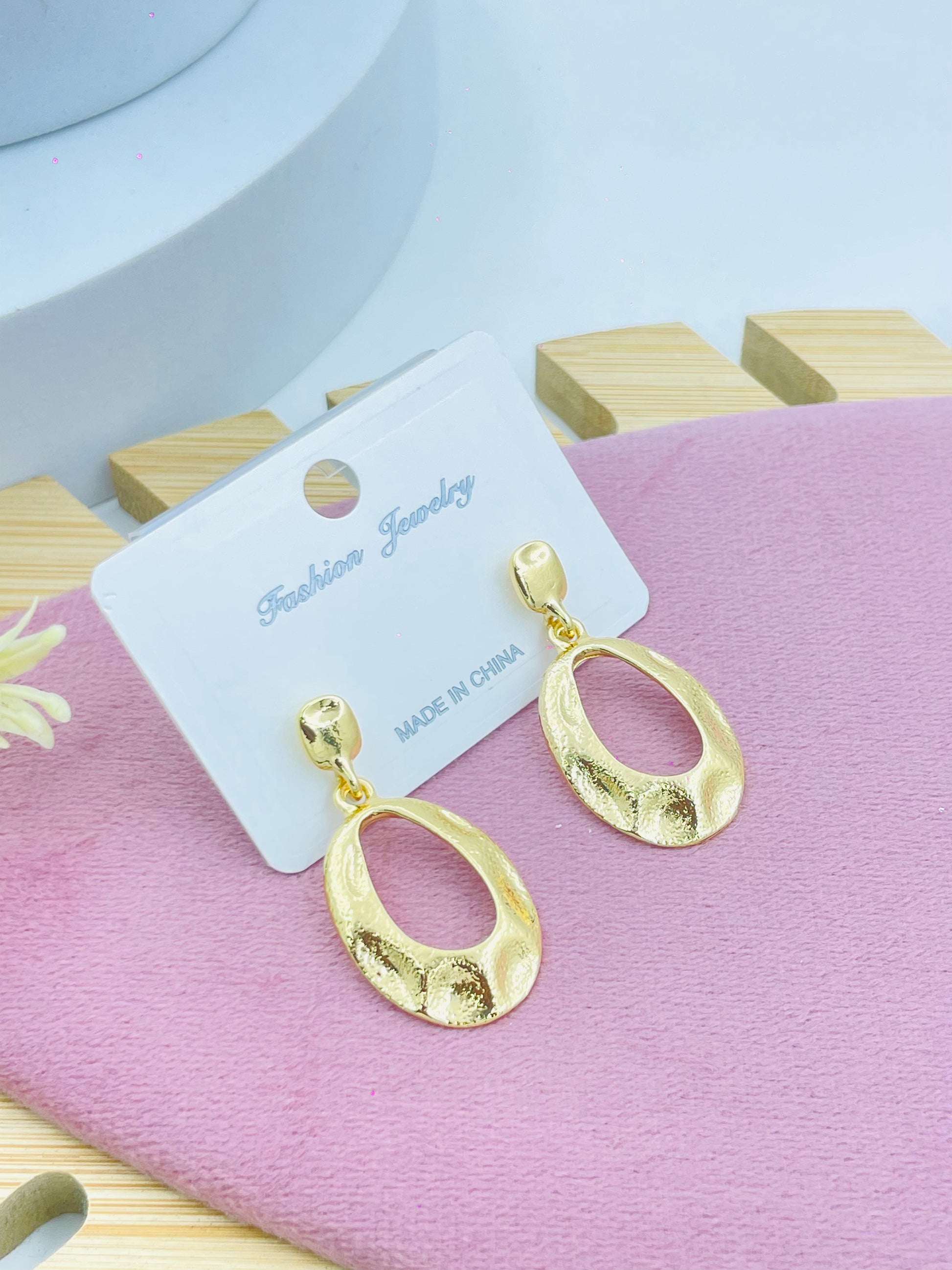 Elegant Gold Textured Oval Drop Earrings