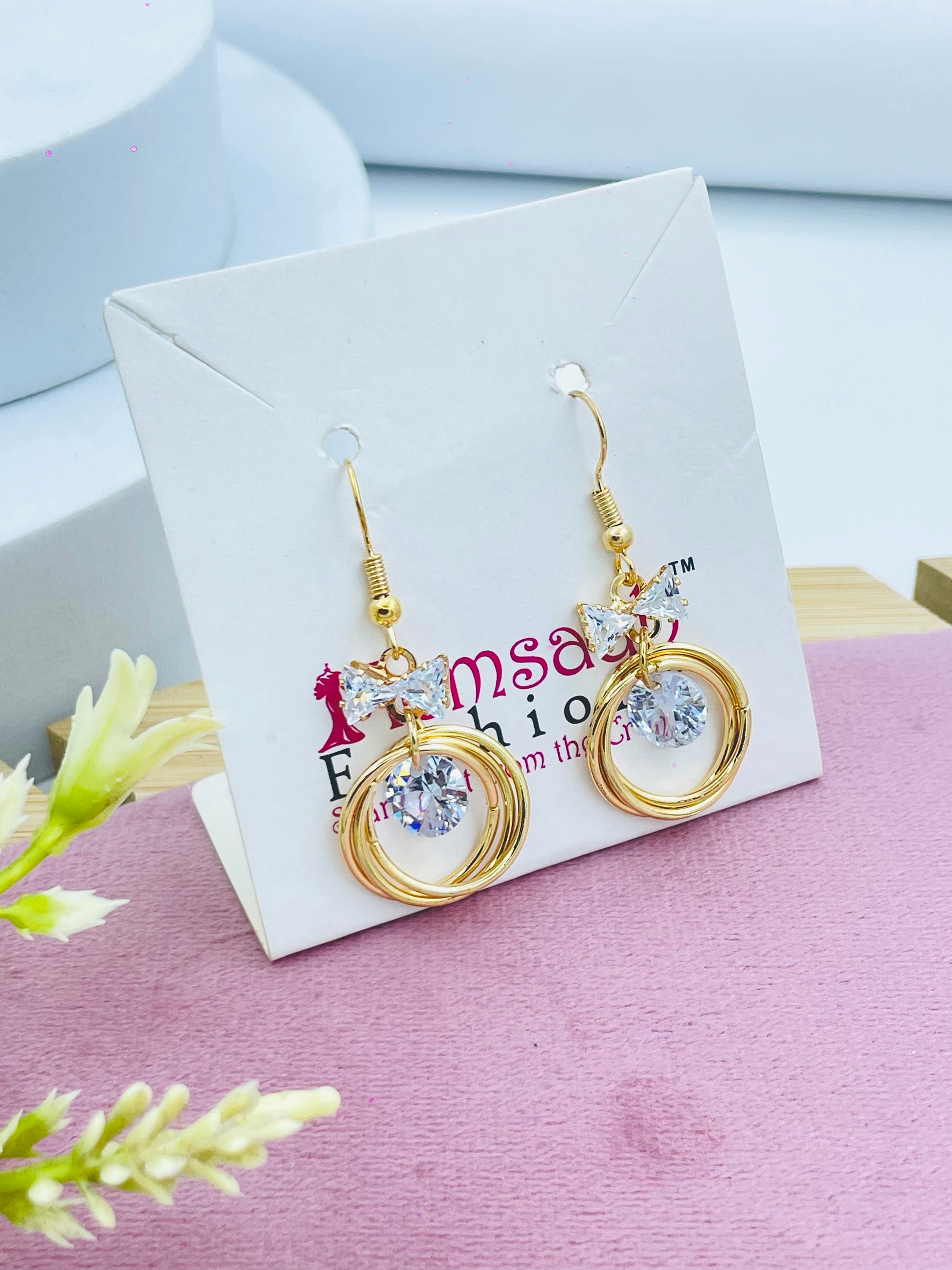 Elegant GoldTone Spiral Disk Earrings with Crystals