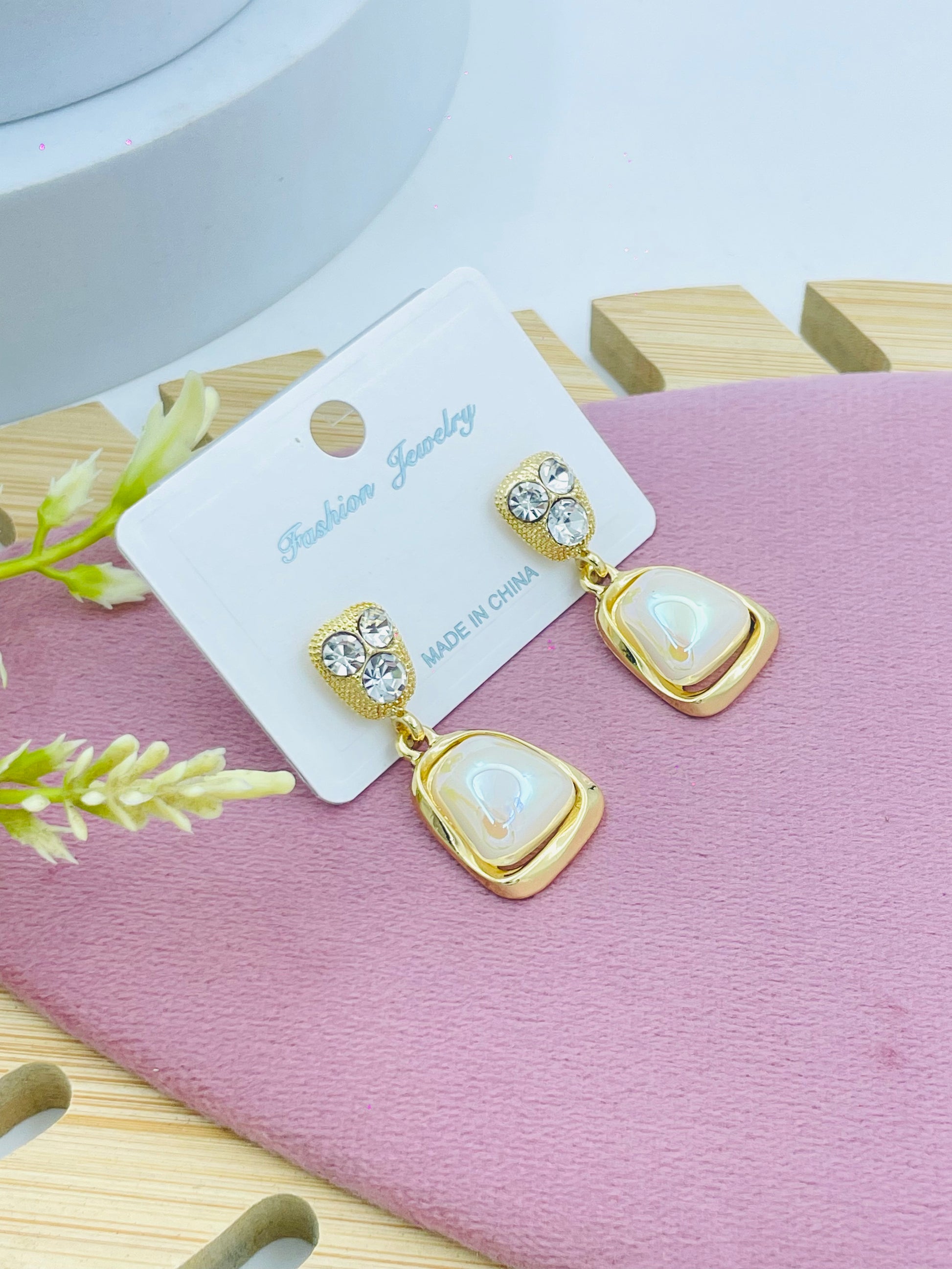 Elegant Gold Drop Earrings with White Gemstones