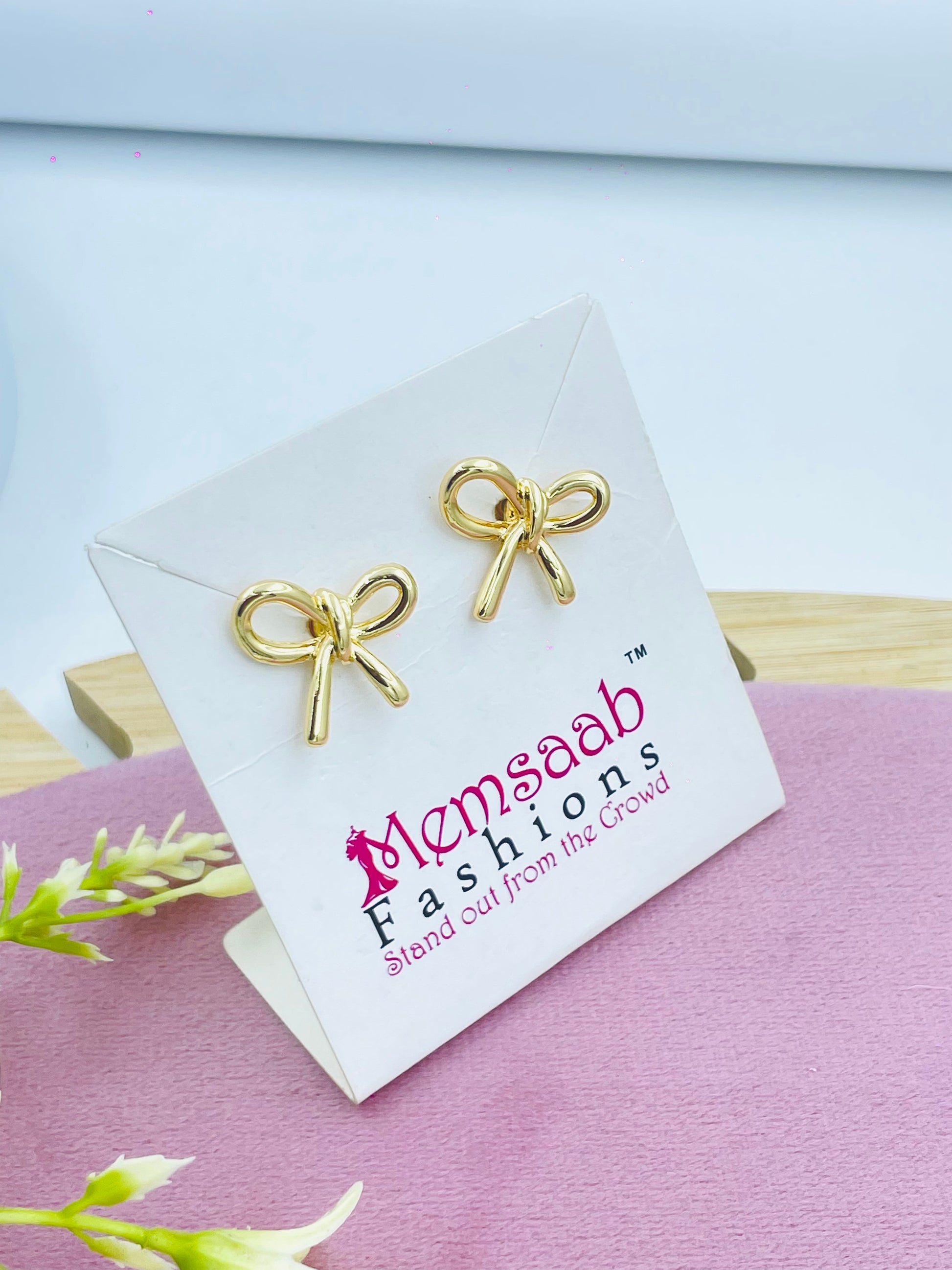 Elegant Gold Tone Bow Earrings