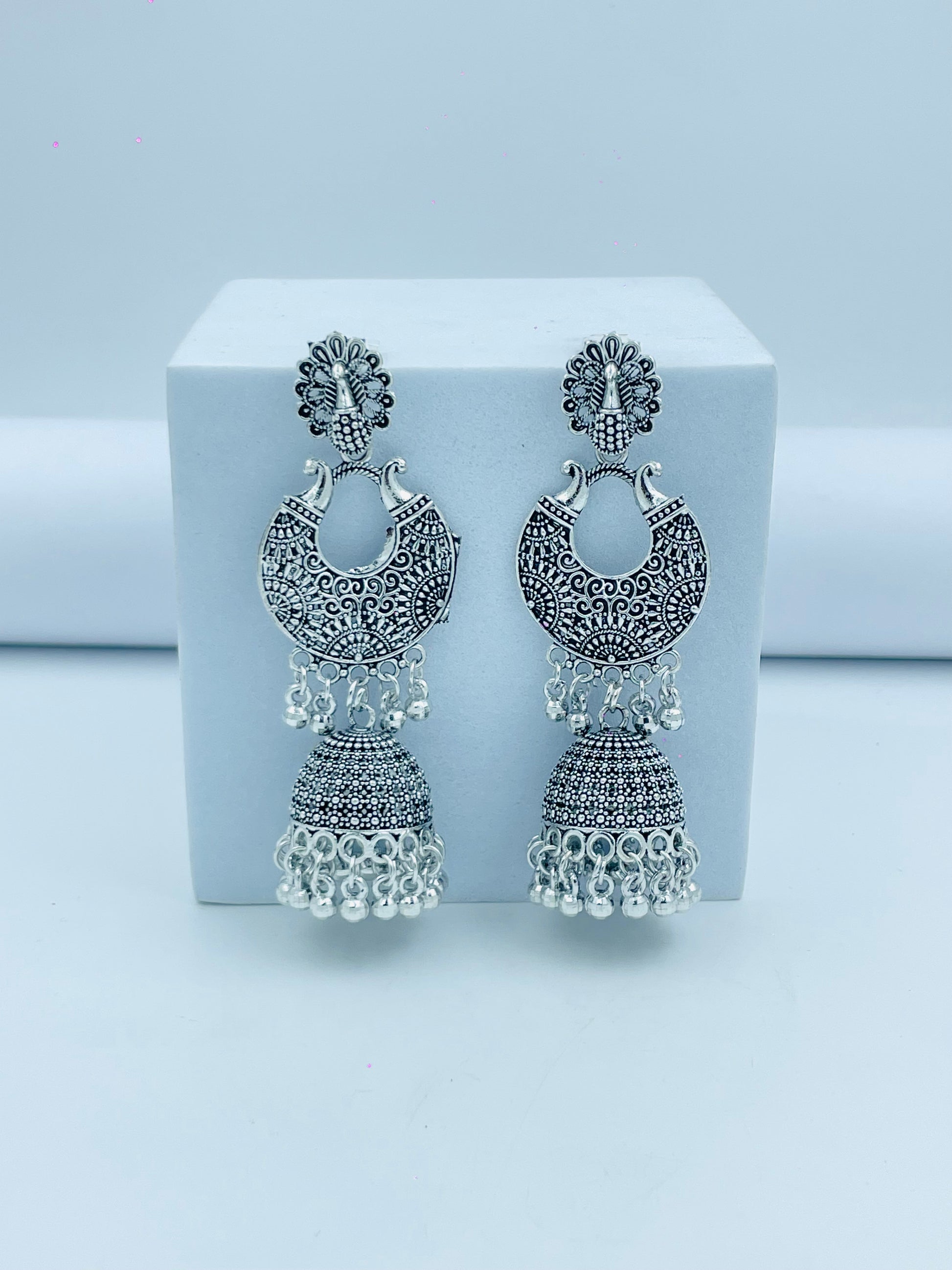 Elegant Silver Peacock Jhumka Earrings