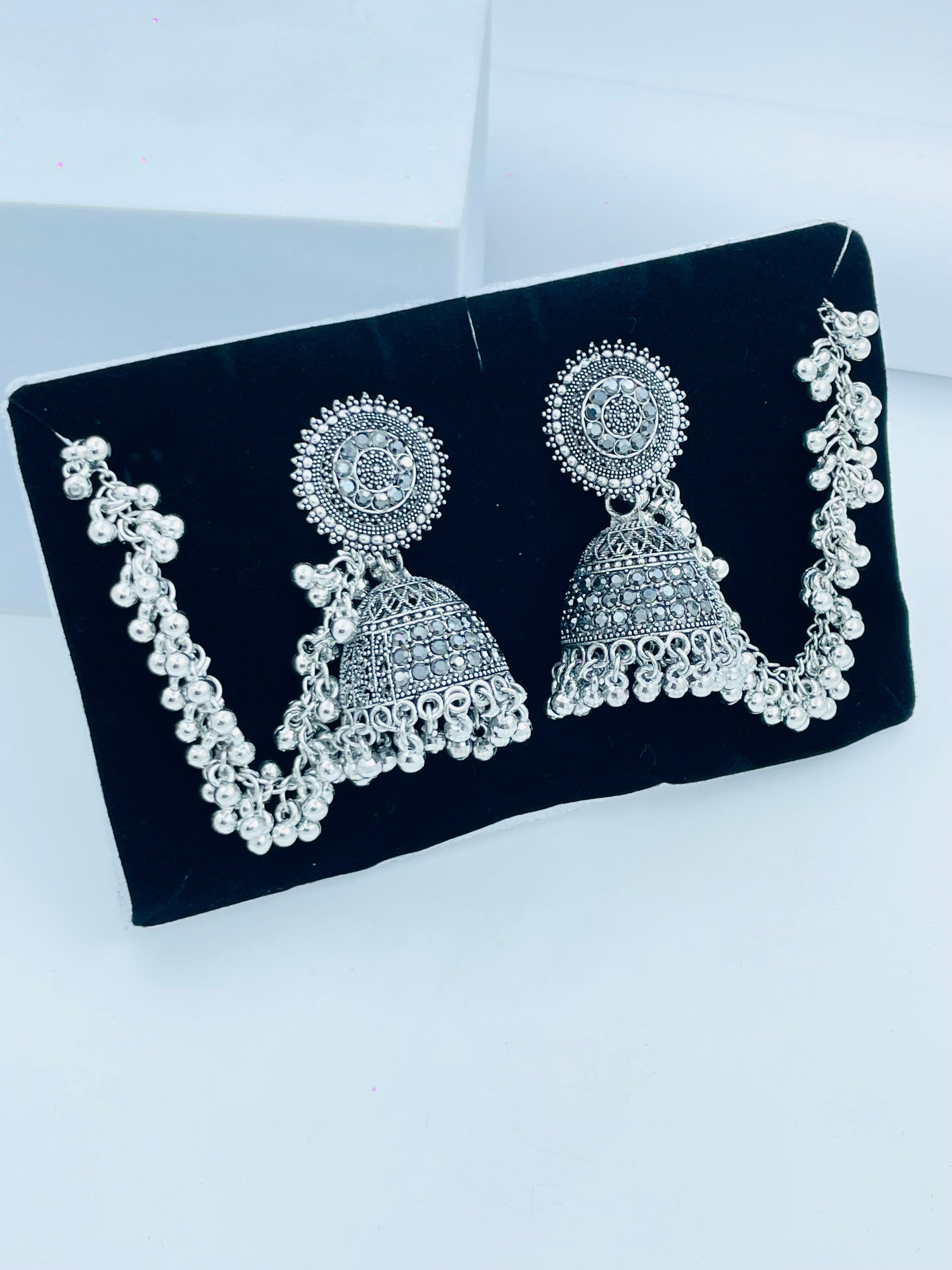 Elegant Silver Jhumka Earrings with Decorative Chain