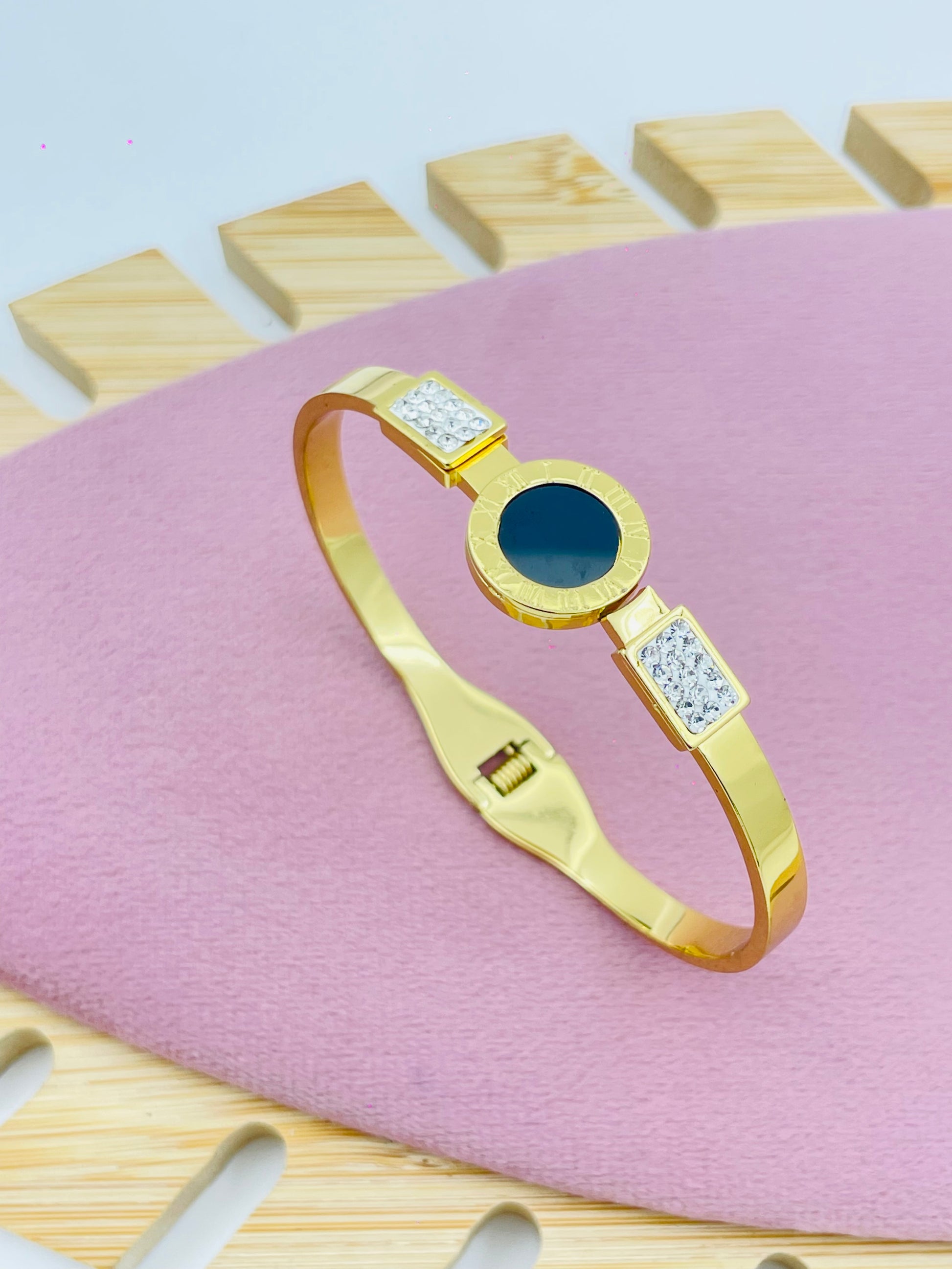 Gold Bracelet with Black Round Center and Crystal Panels | Luxury Jewelry