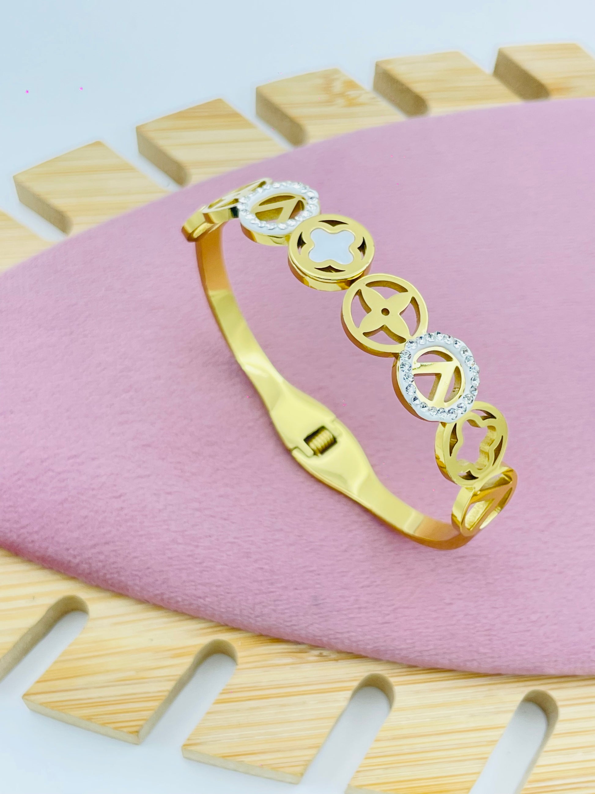 Elegant Gold Bracelet with Decorative Circles and Rhinestones