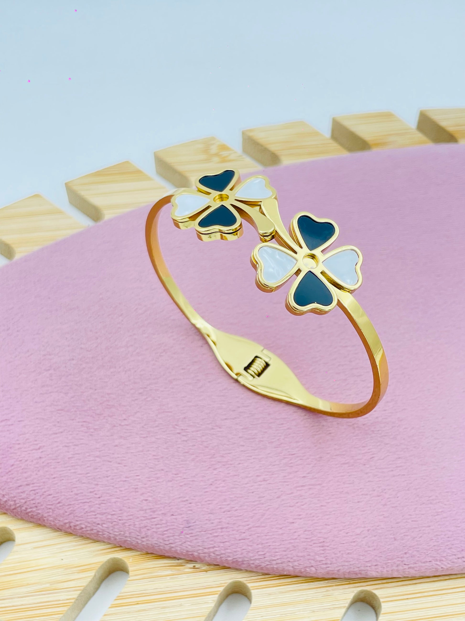 Elegant Gold Bangle with Dual Clover Heart Petals