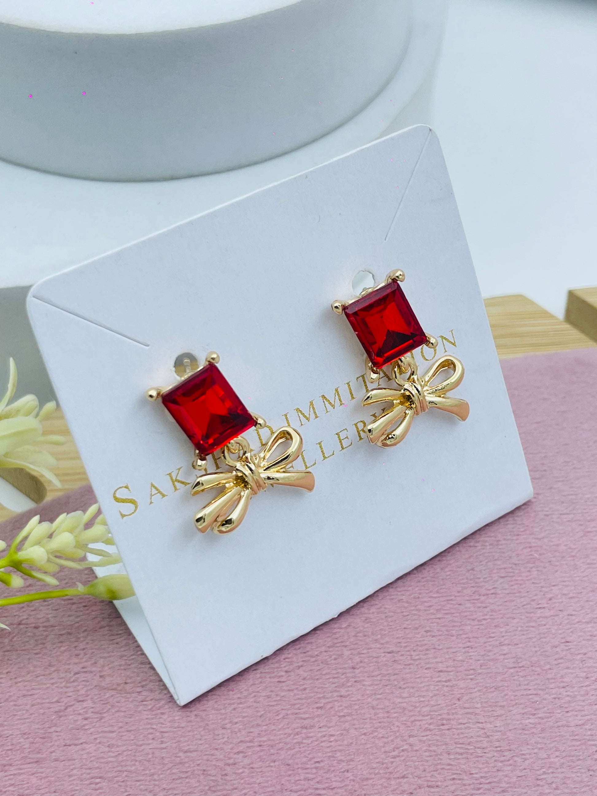 Elegant Red Gemstone Bow Earrings