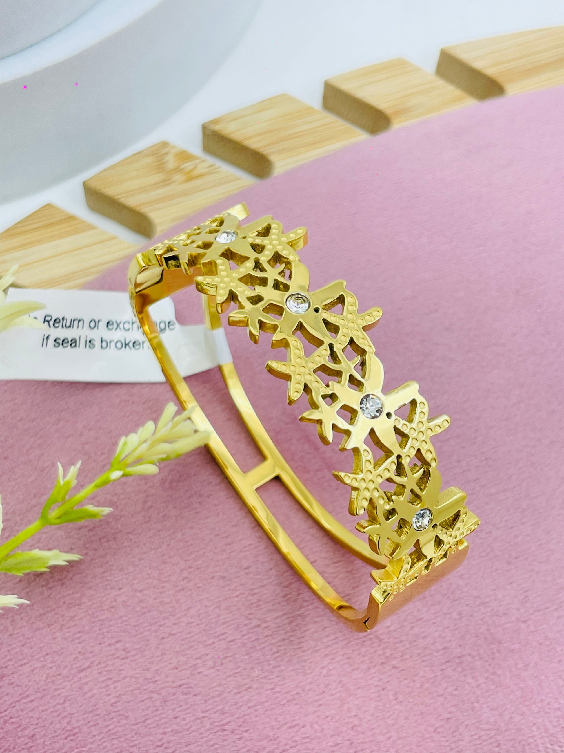 Elegant Gold Floral Pattern Bracelet with Crystals