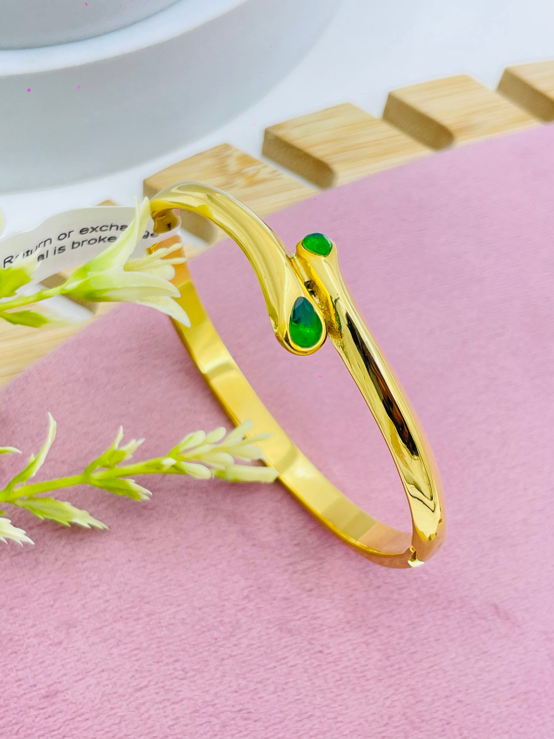 Elegant Gold Plated Cuff Bracelet with Emerald Accents