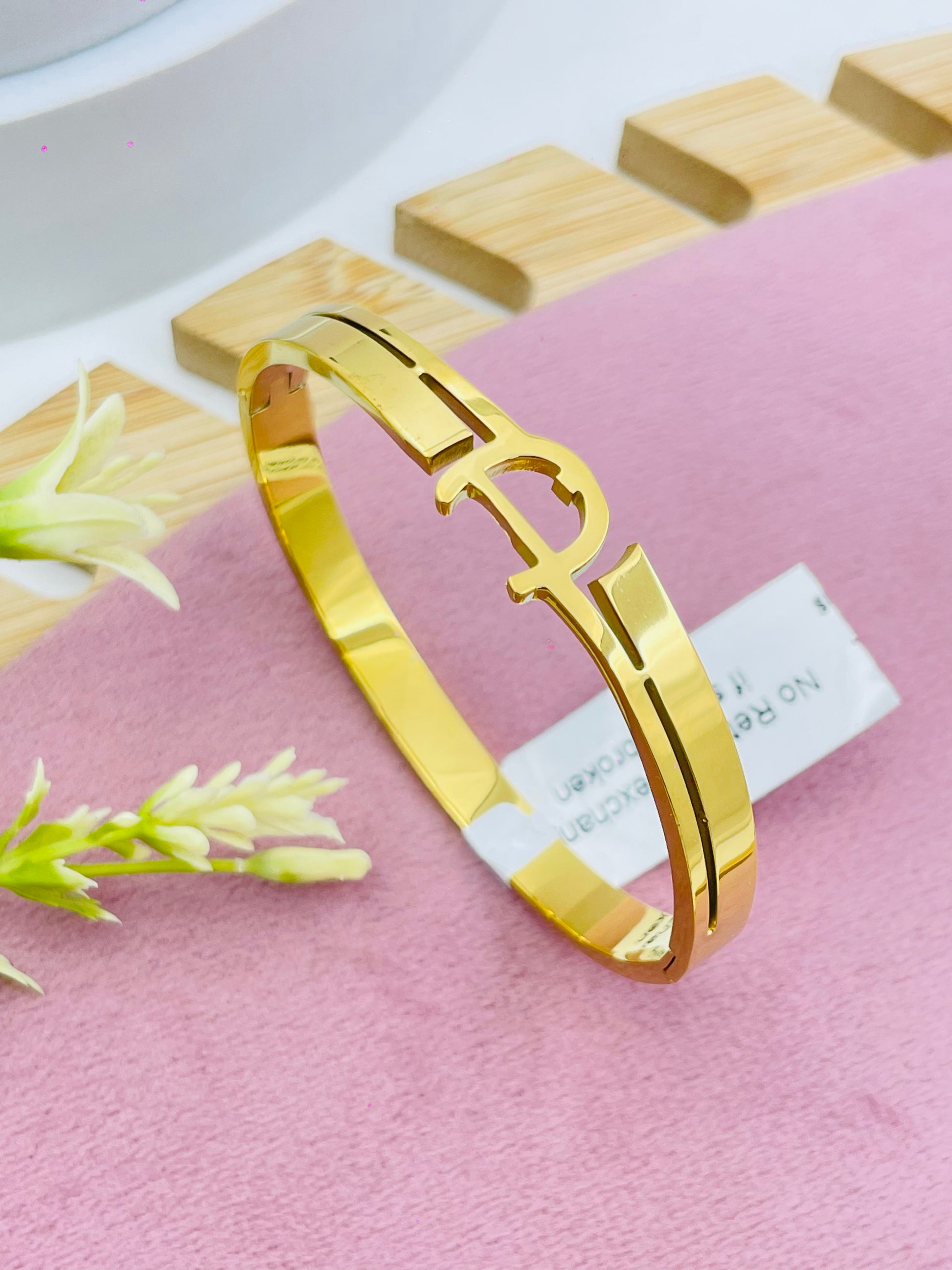 Elegant Goldtone Cutout Bangle Bracelet