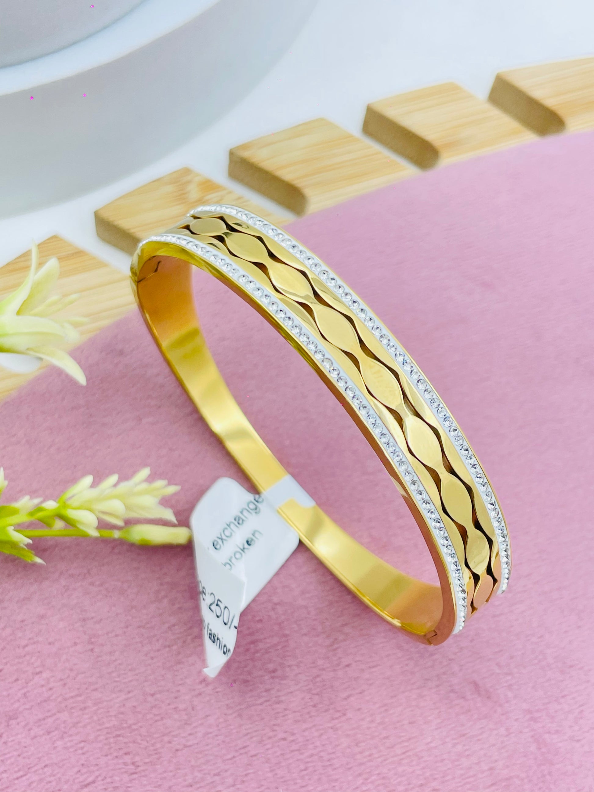 Elegant Gold and DiamondCut Bangle Bracelet