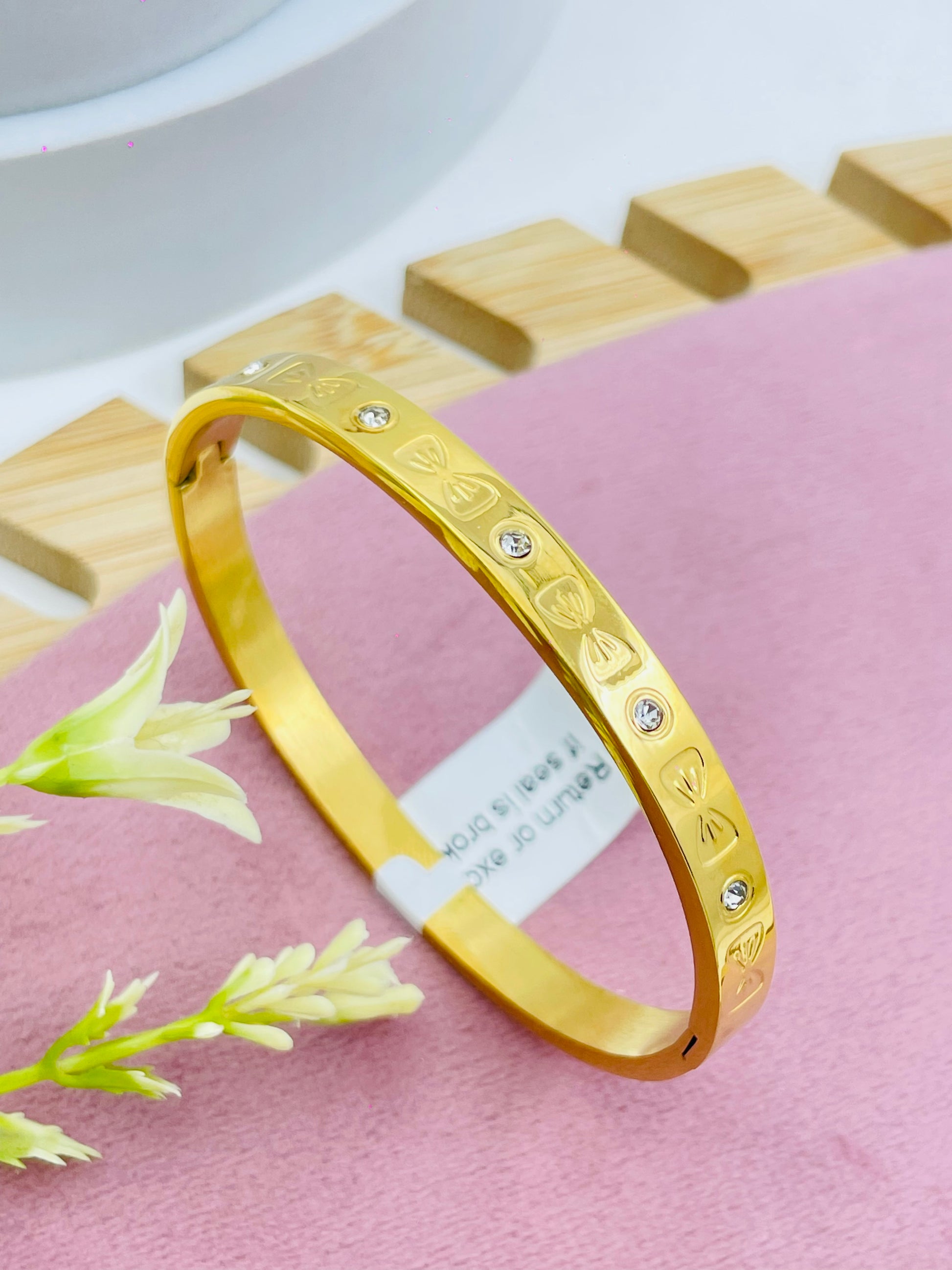 Elegant Gold Bangle with Diamond Accents