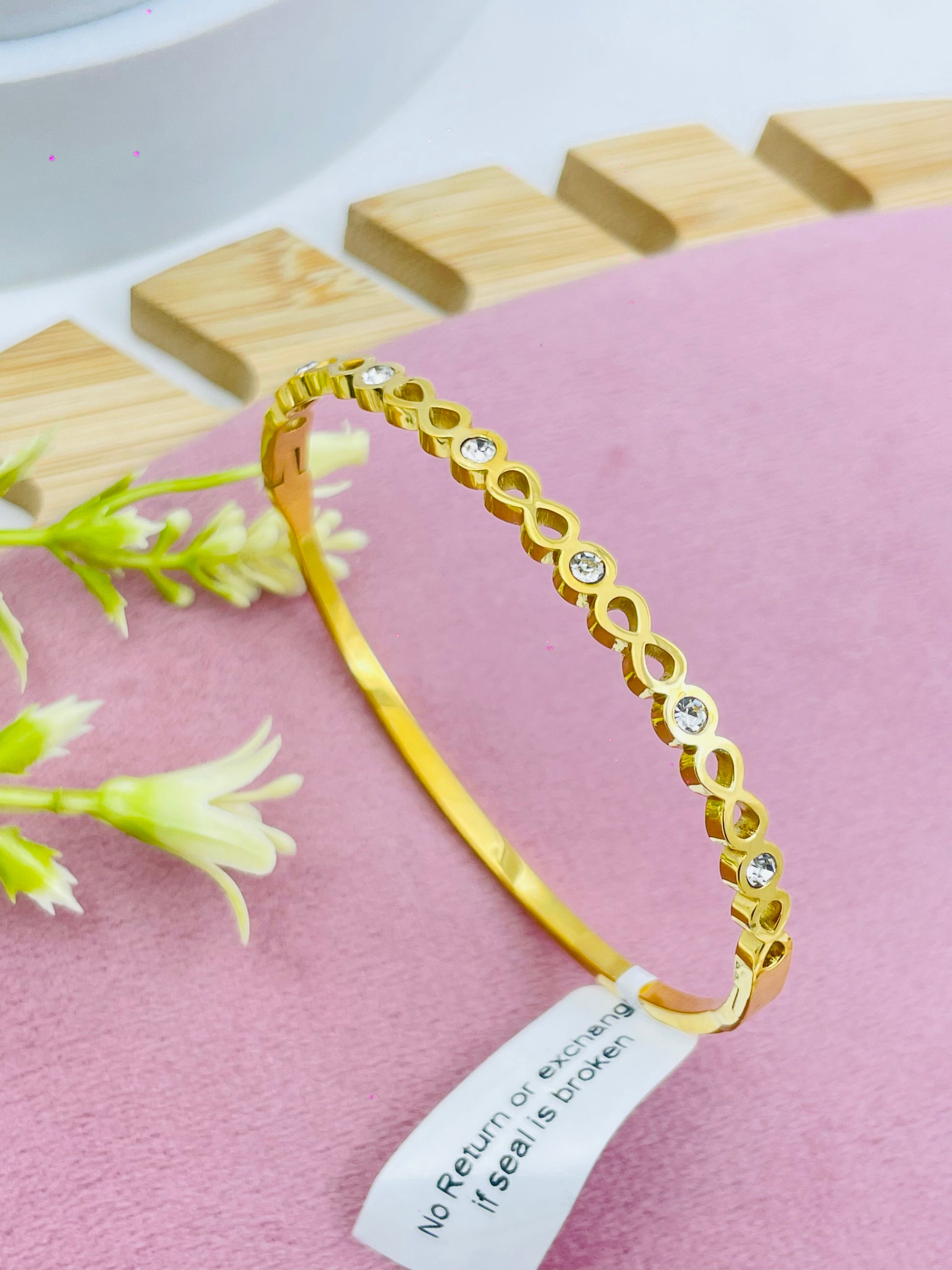 Elegant Gold Bangle with Diamond Accents