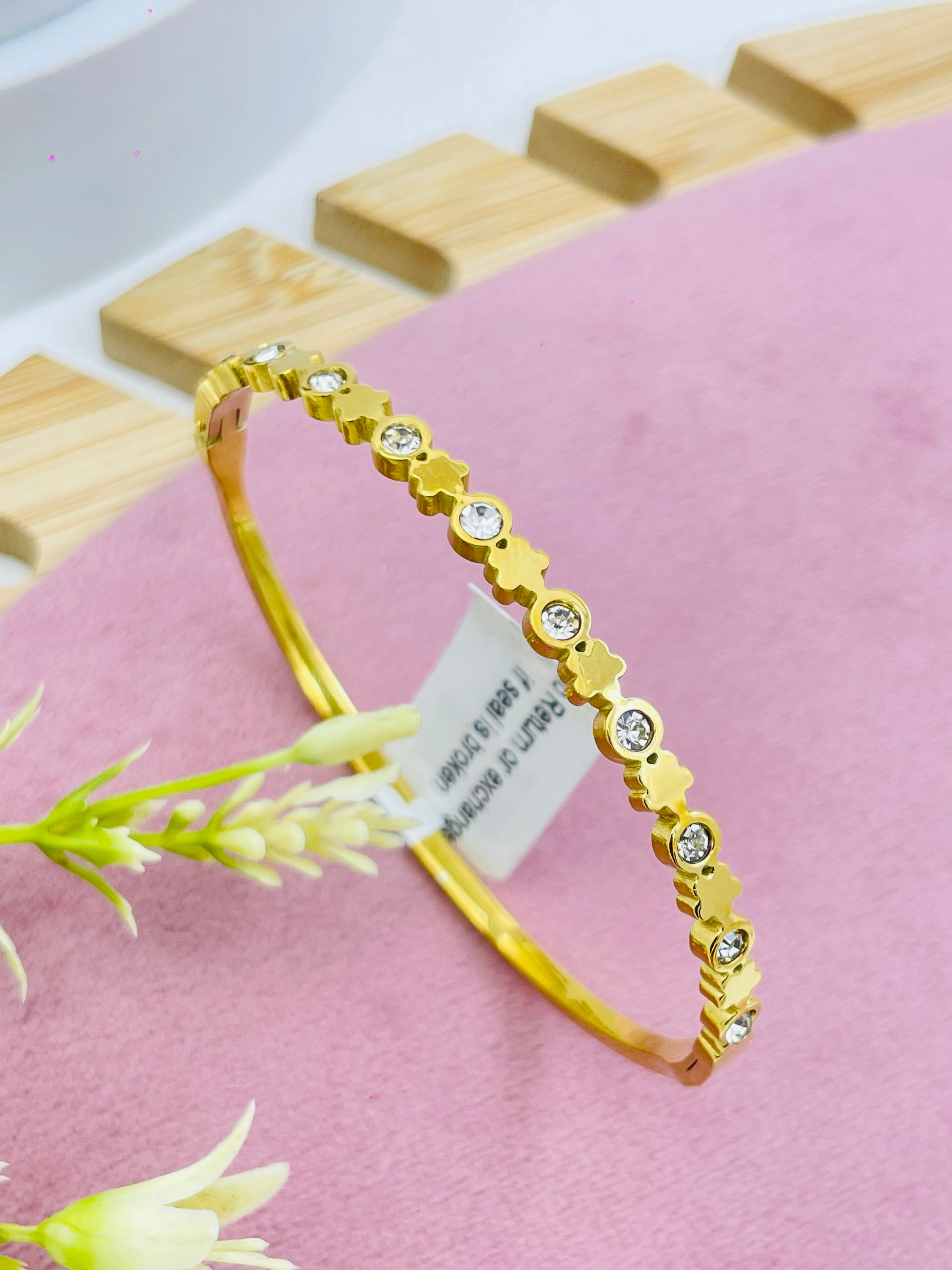 Elegant Gold and Diamond Bangle Bracelet